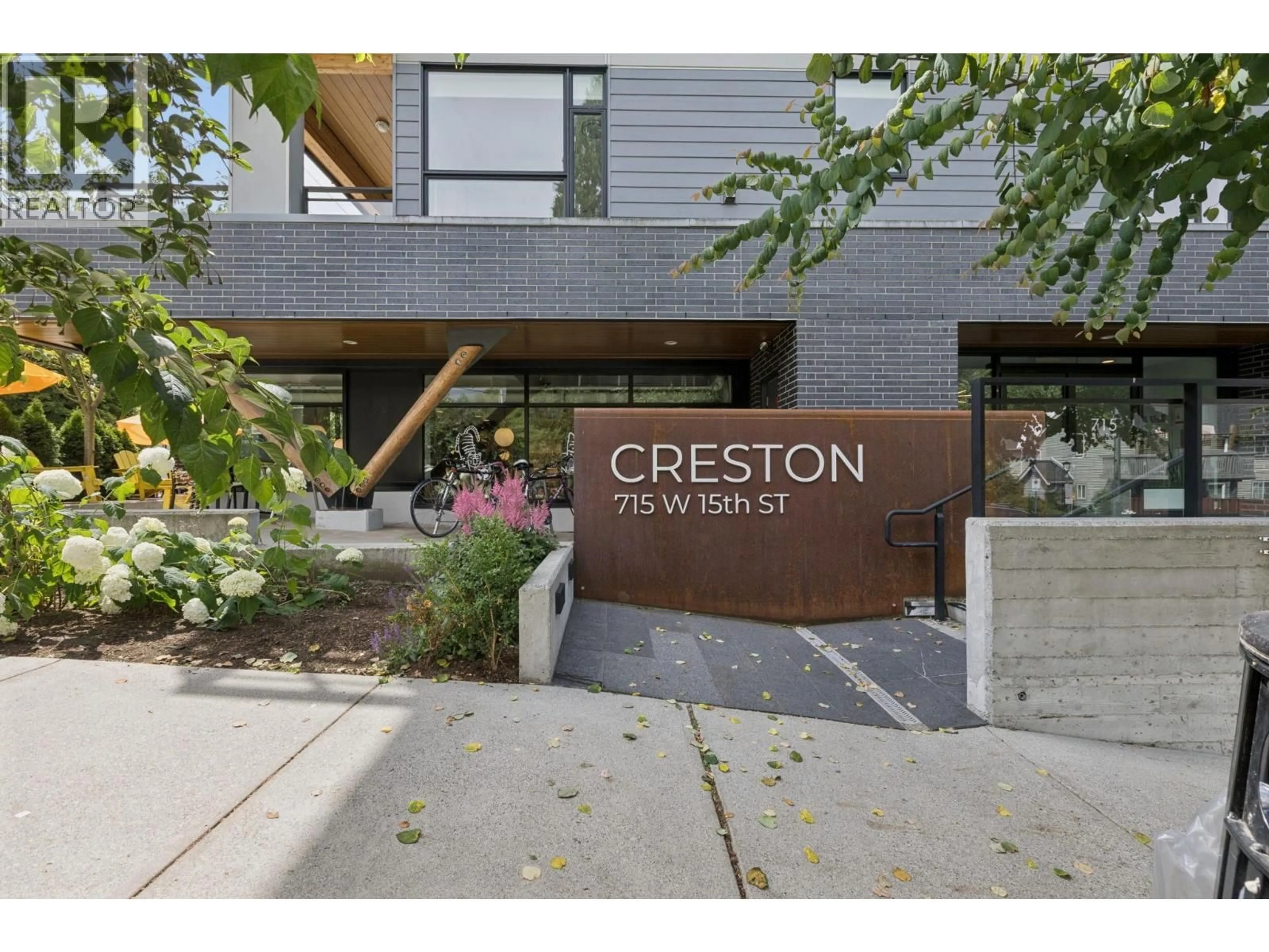 Home with brick exterior material, street for 209 - 715 15TH STREET, North Vancouver British Columbia V7M1T2