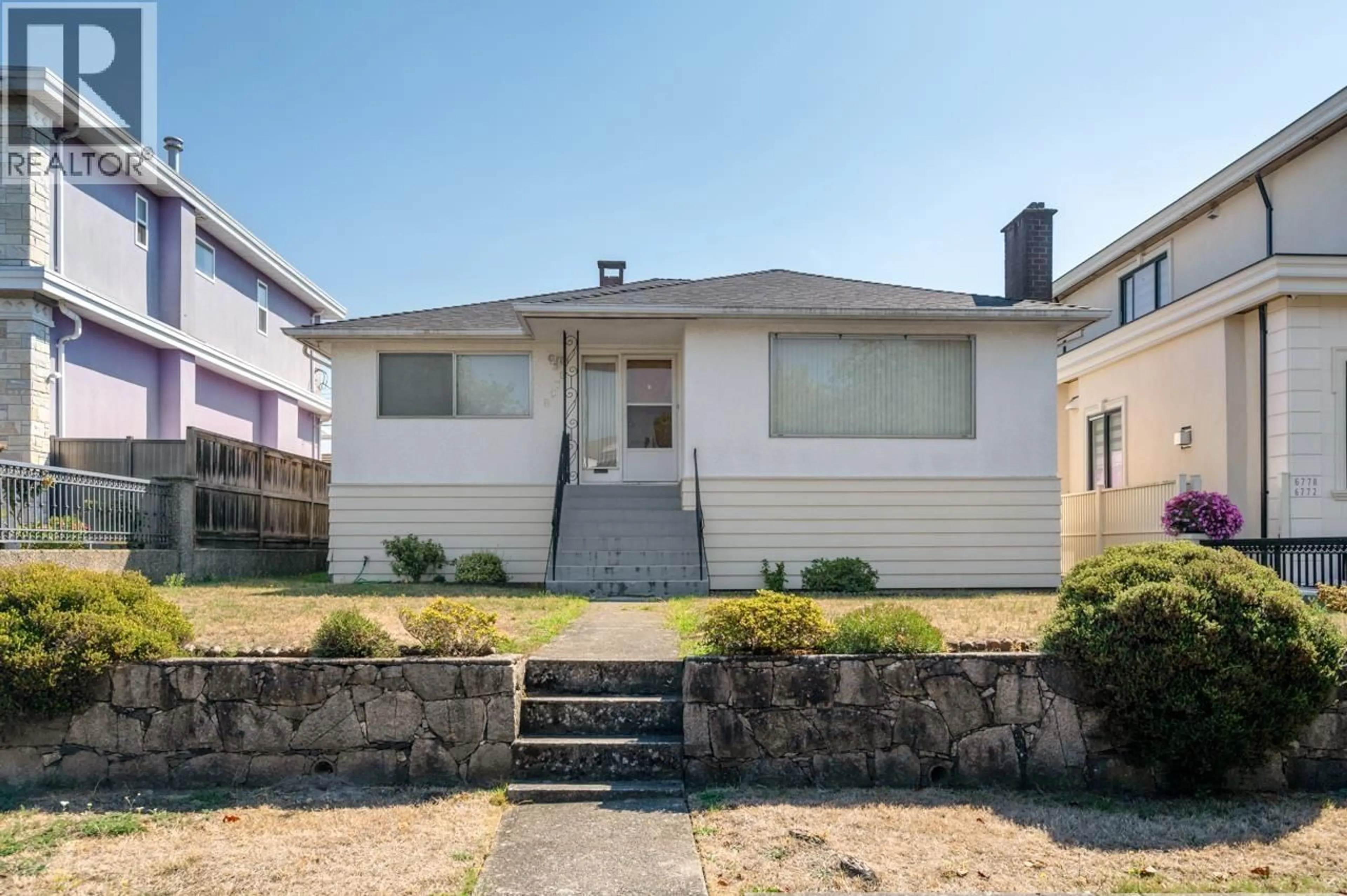 Home with vinyl exterior material, street for 6758 KILLARNEY STREET, Vancouver British Columbia V5S2Y3