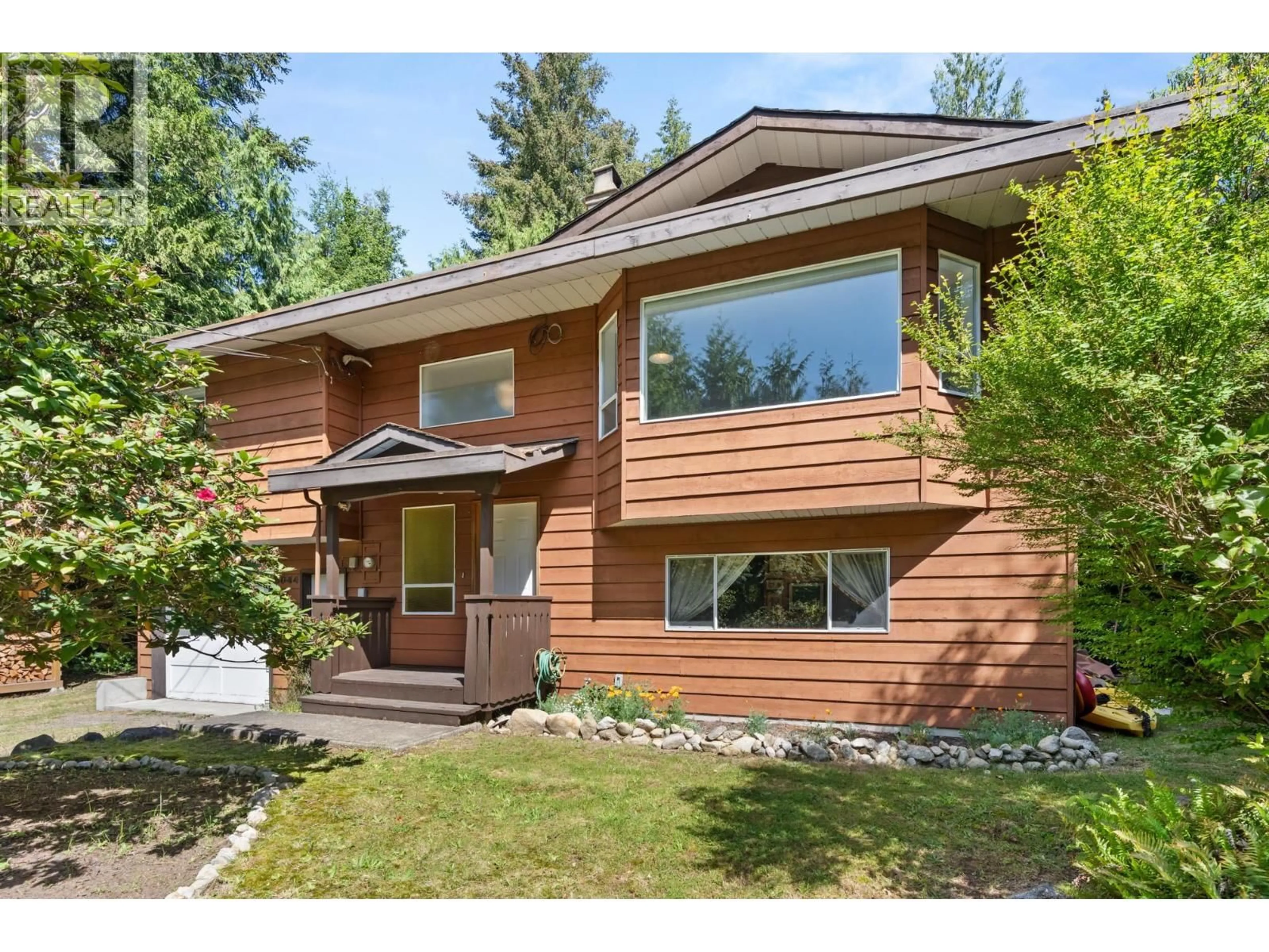 Home with vinyl exterior material, street for 8044 DOGWOOD DRIVE, Halfmoon Bay British Columbia V7Z1A7