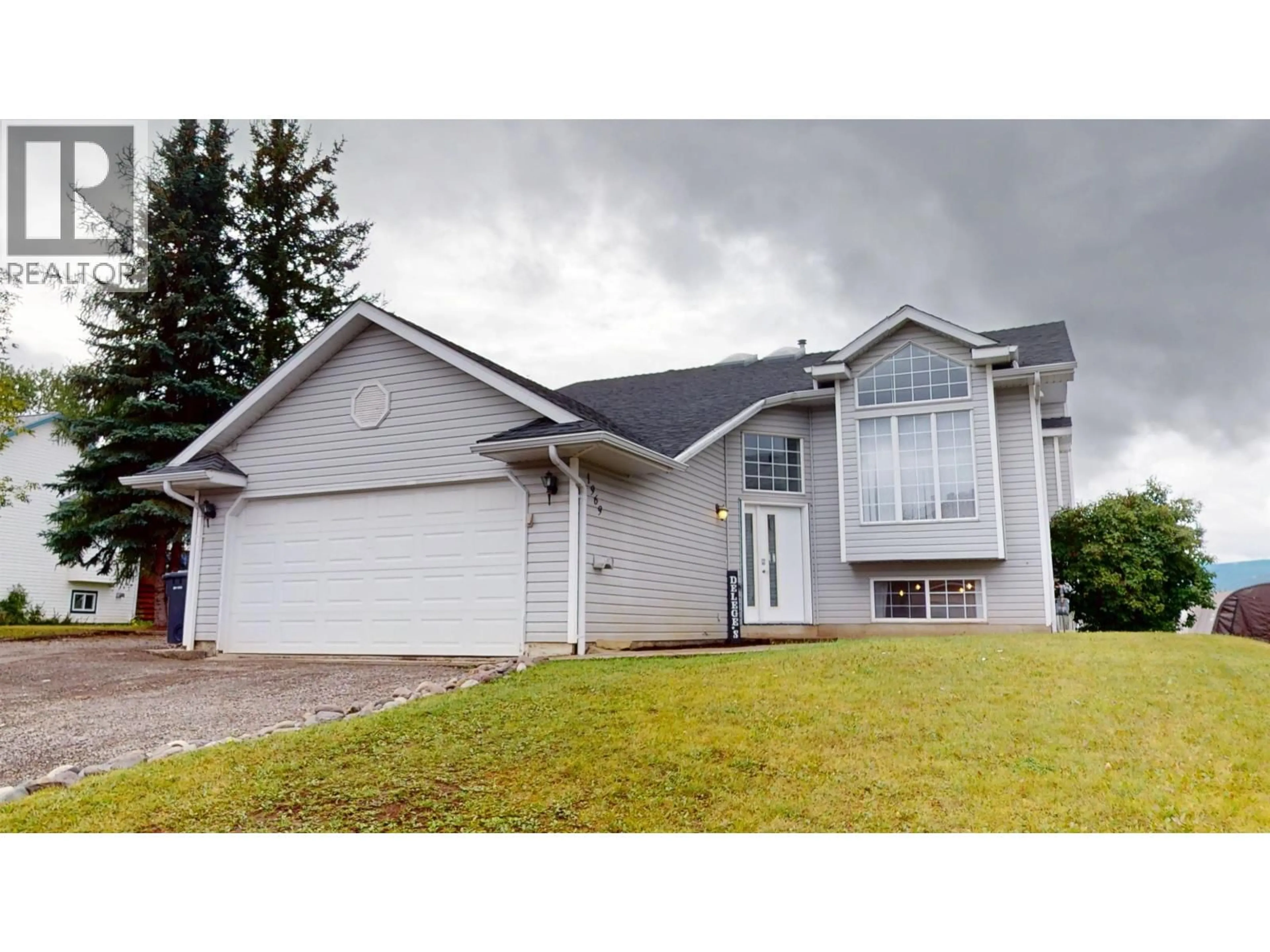 Home with vinyl exterior material, street for 1969 GOOLD ROAD, Houston British Columbia V0J1Z0