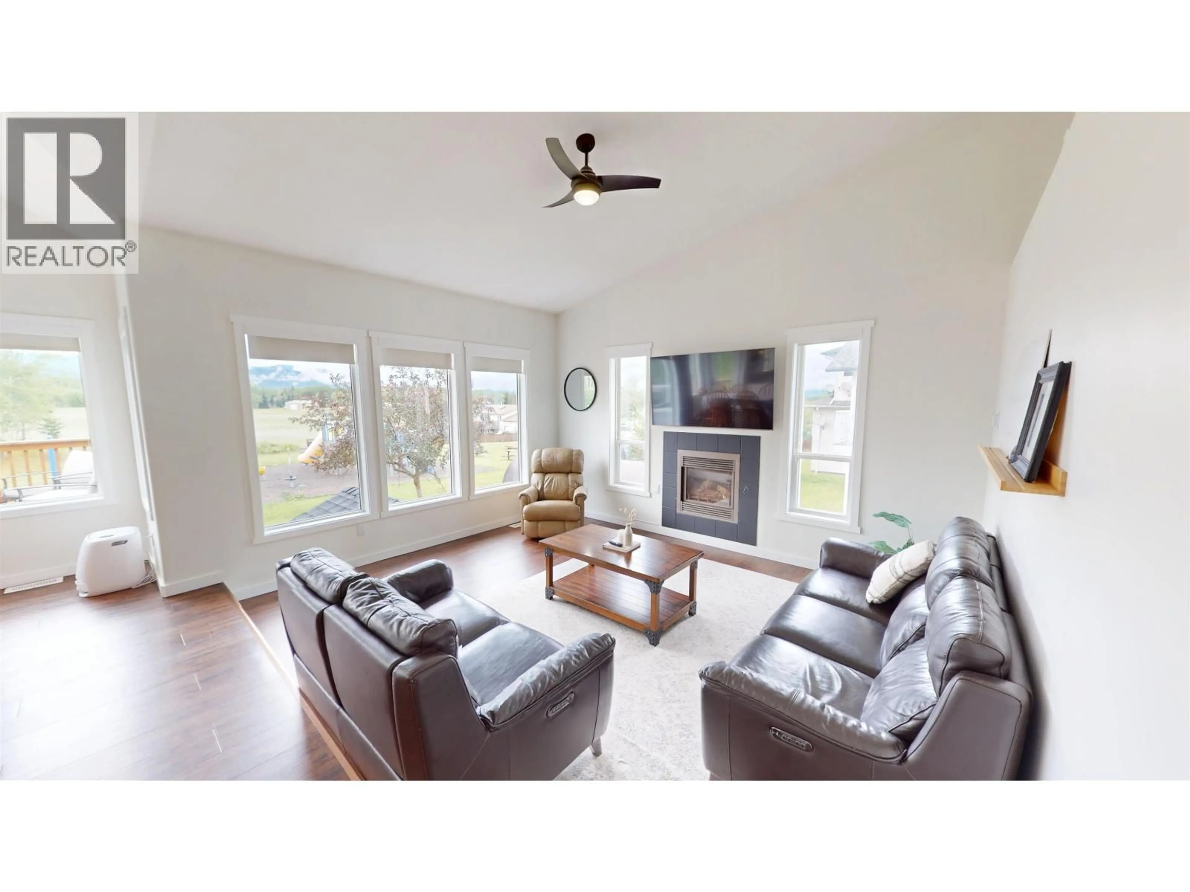 Living room with furniture, wood/laminate floor for 1969 GOOLD ROAD, Houston British Columbia V0J1Z0