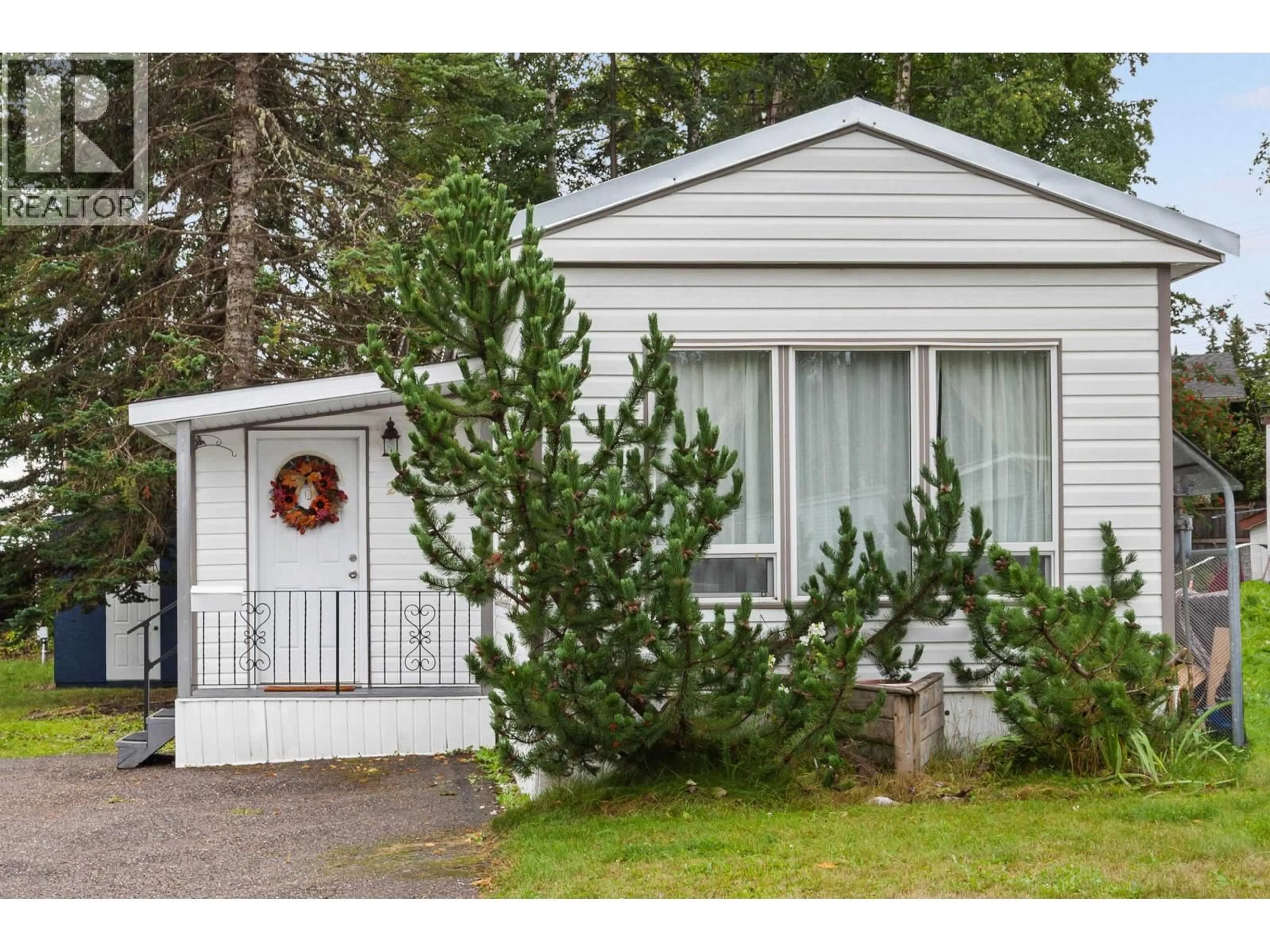 Home with vinyl exterior material, street for 21 - 7170 HART HIGHWAY, Prince George British Columbia V2K3A3