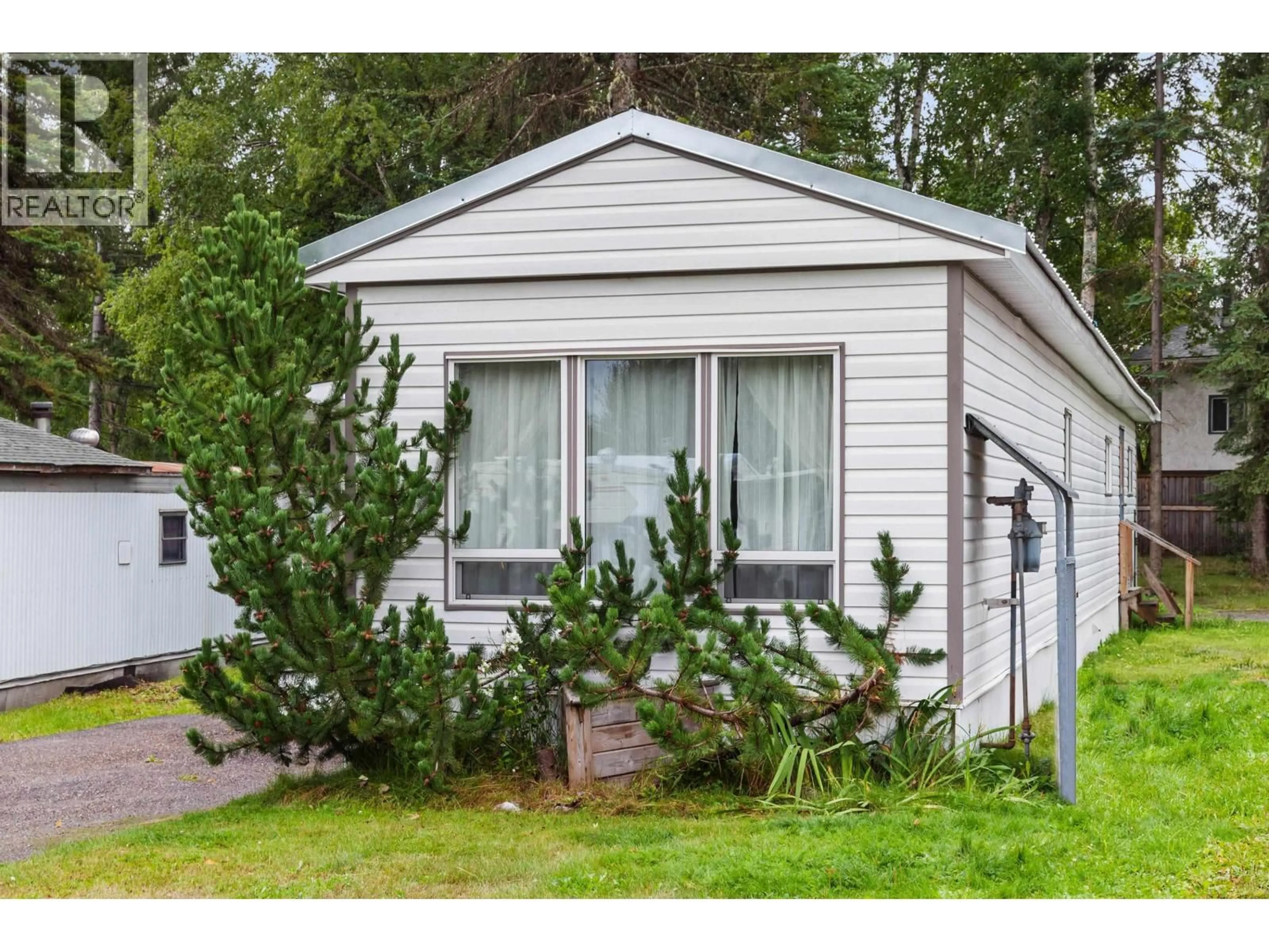 Home with vinyl exterior material, street for 21 - 7170 HART HIGHWAY, Prince George British Columbia V2K3A3