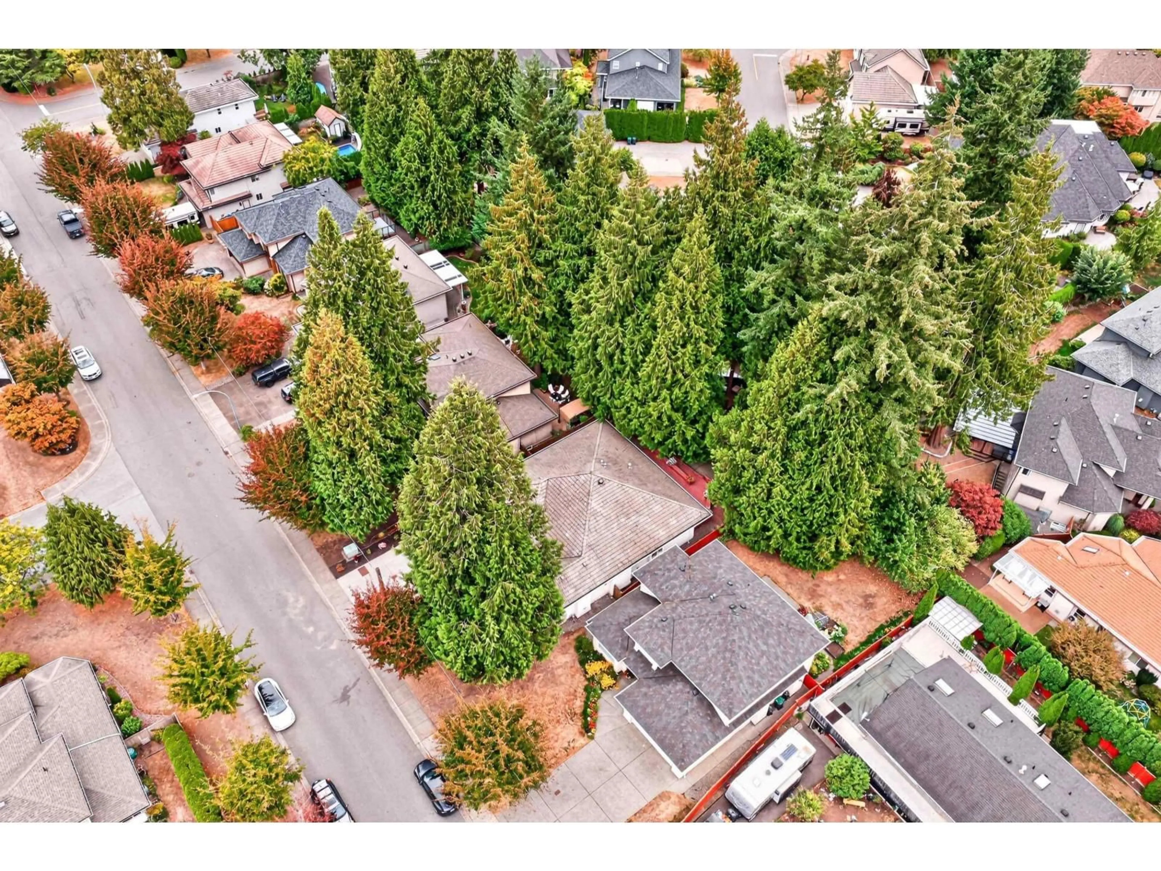 A pic from outside/outdoor area/front of a property/back of a property/a pic from drone, unknown for 4484 210A STREET, Langley British Columbia V3A8M2