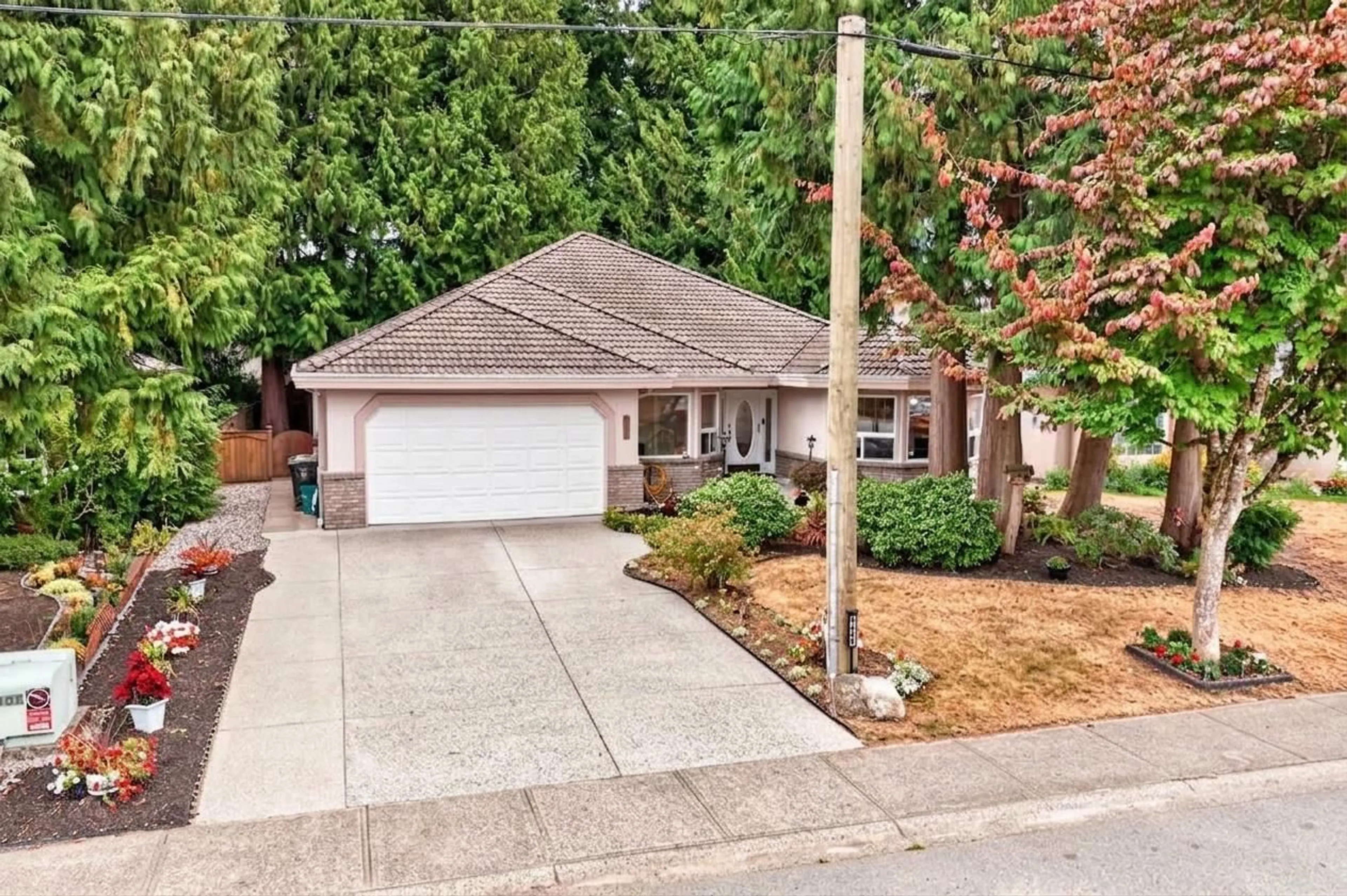 A pic from outside/outdoor area/front of a property/back of a property/a pic from drone, street for 4484 210A STREET, Langley British Columbia V3A8M2