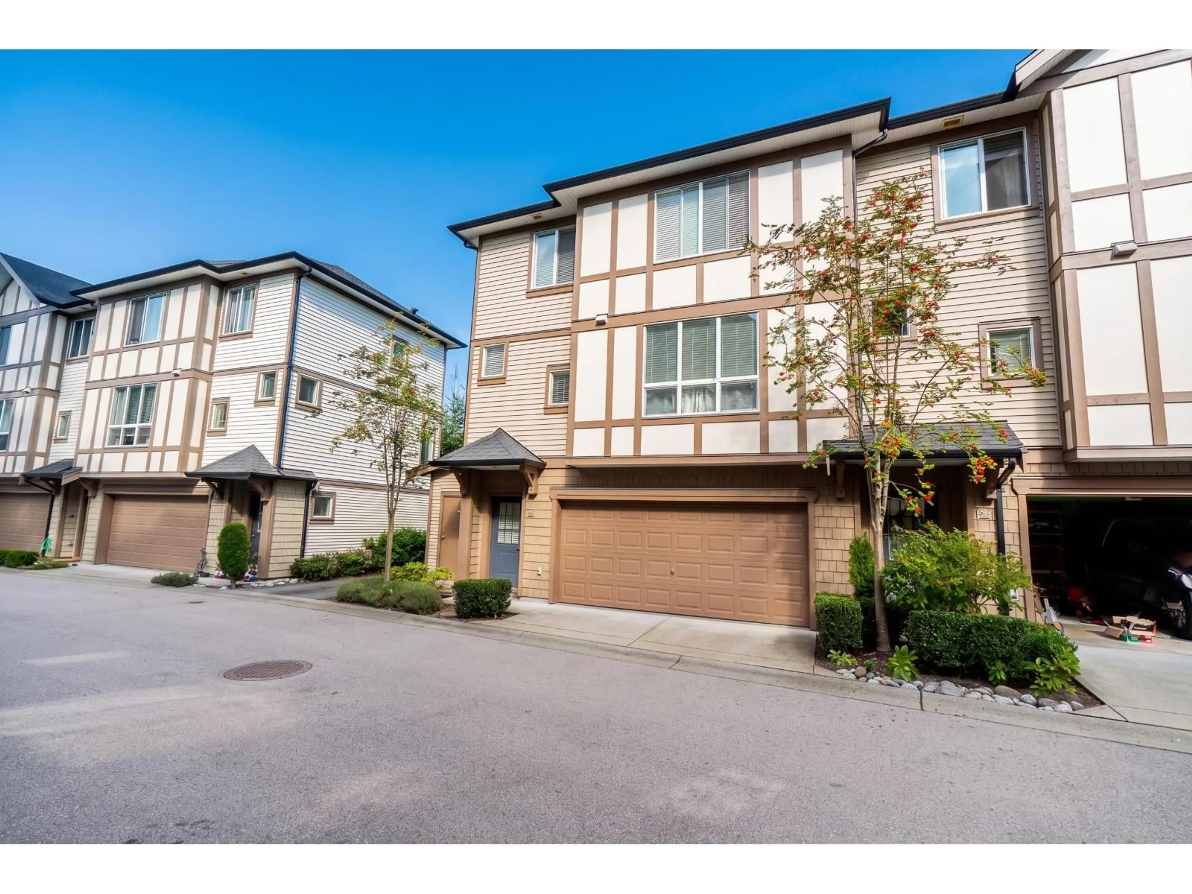 A pic from outside/outdoor area/front of a property/back of a property/a pic from drone, street for 34 - 7848 209 STREET, Langley British Columbia V2Y0M4