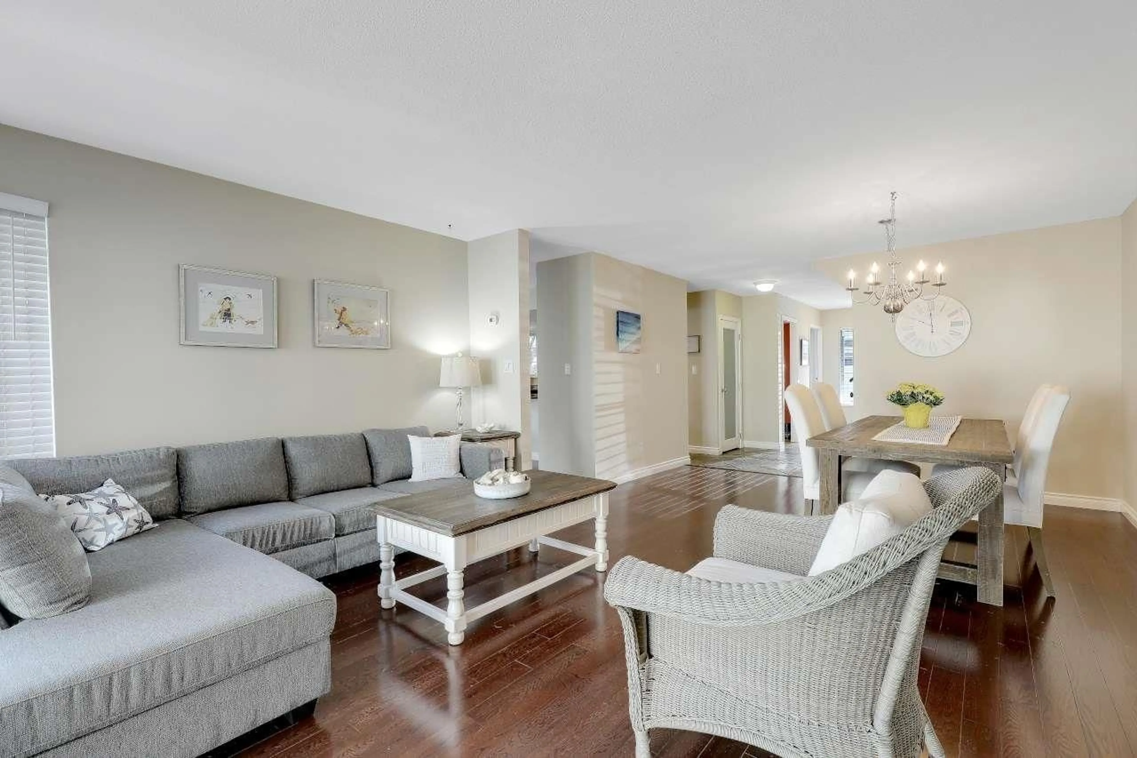 Living room with furniture, wood/laminate floor for 110 - 16335 14 AVENUE, Surrey British Columbia V4A1H2