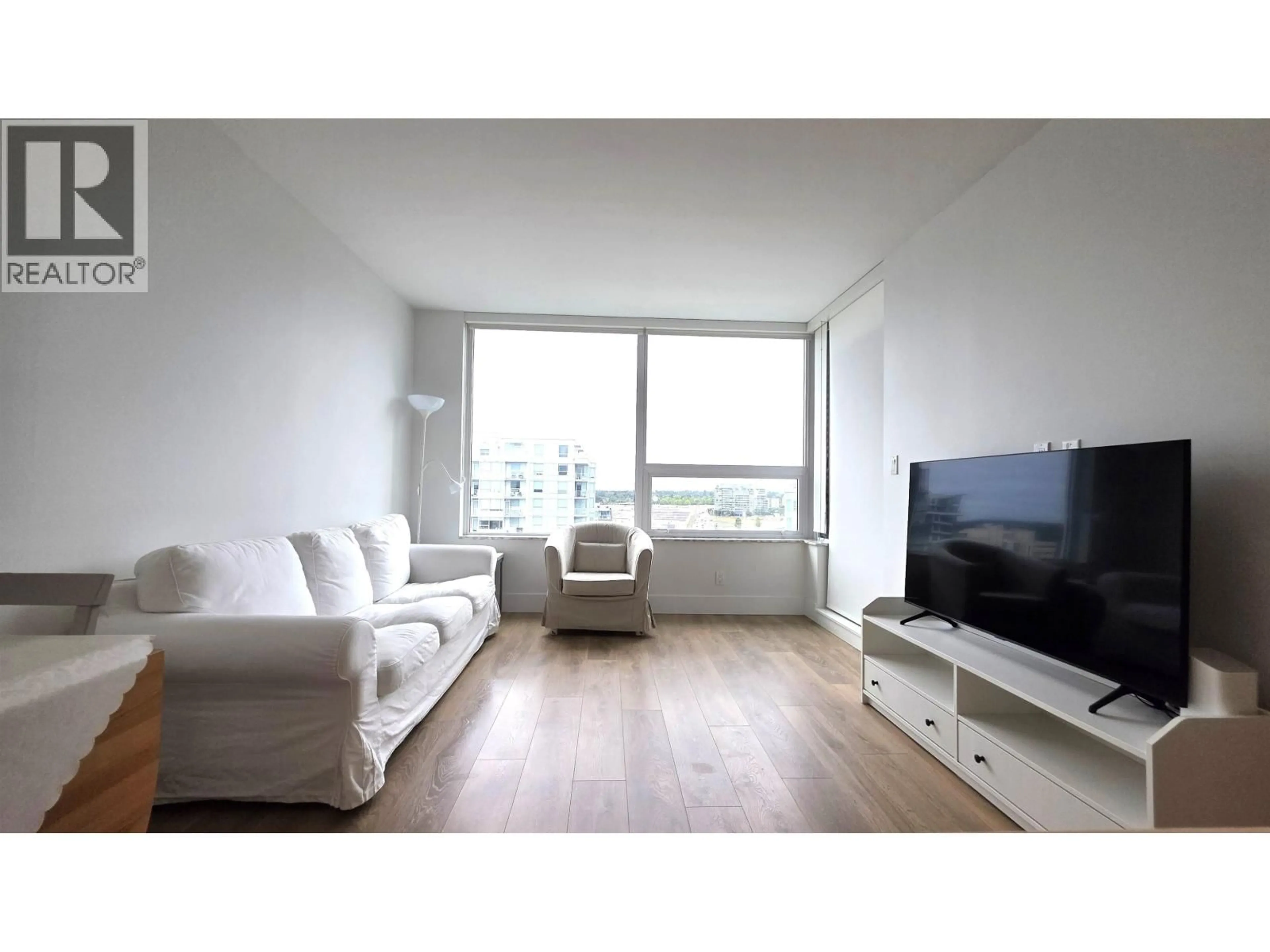 Living room with furniture, wood/laminate floor for 1306 - 6900 PEARSON WAY, Richmond British Columbia V7C0C9