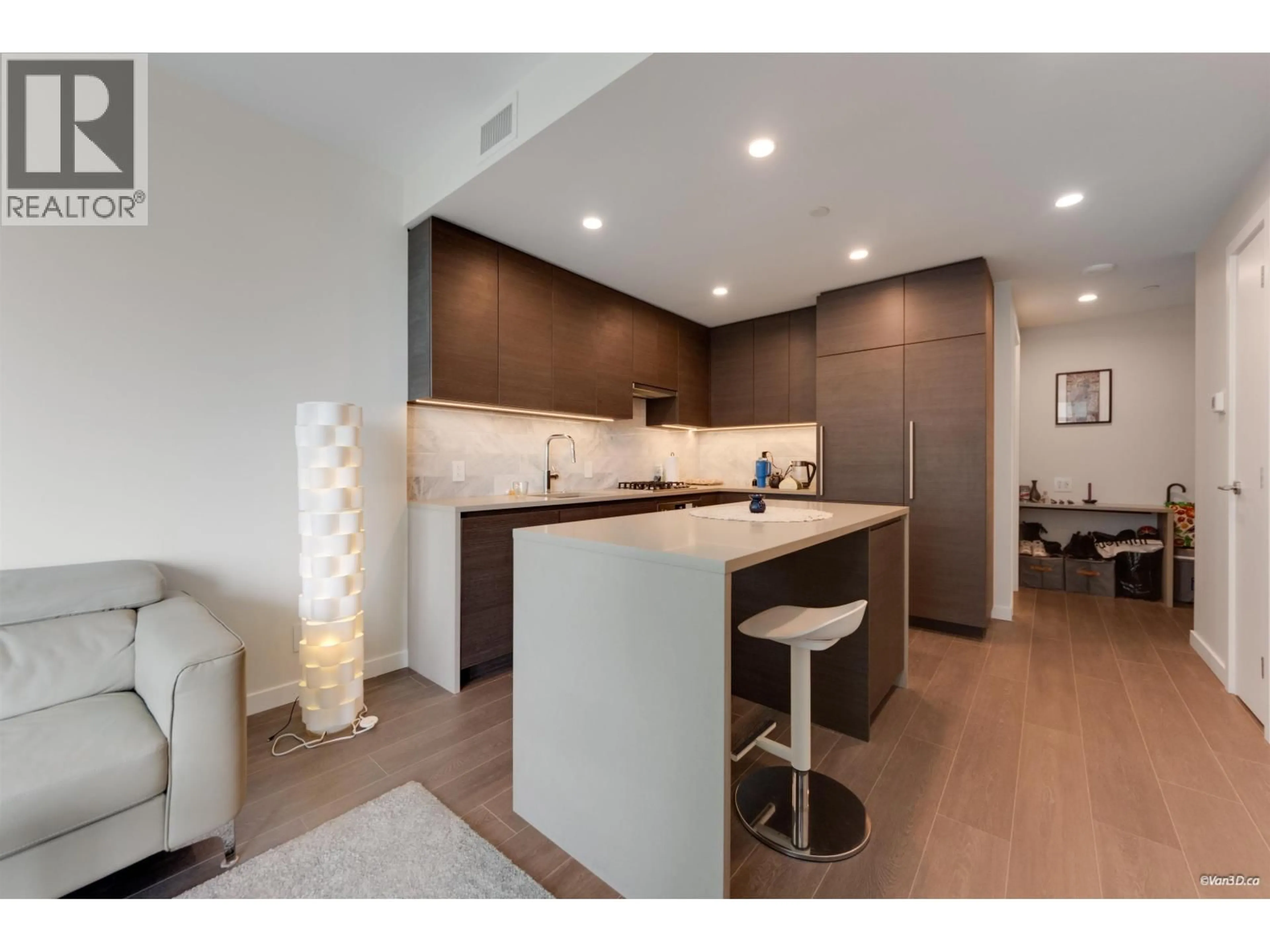 Open concept kitchen, wood/laminate floor for 2812 - 2108 GILMORE AVENUE, Burnaby British Columbia V5C0N8