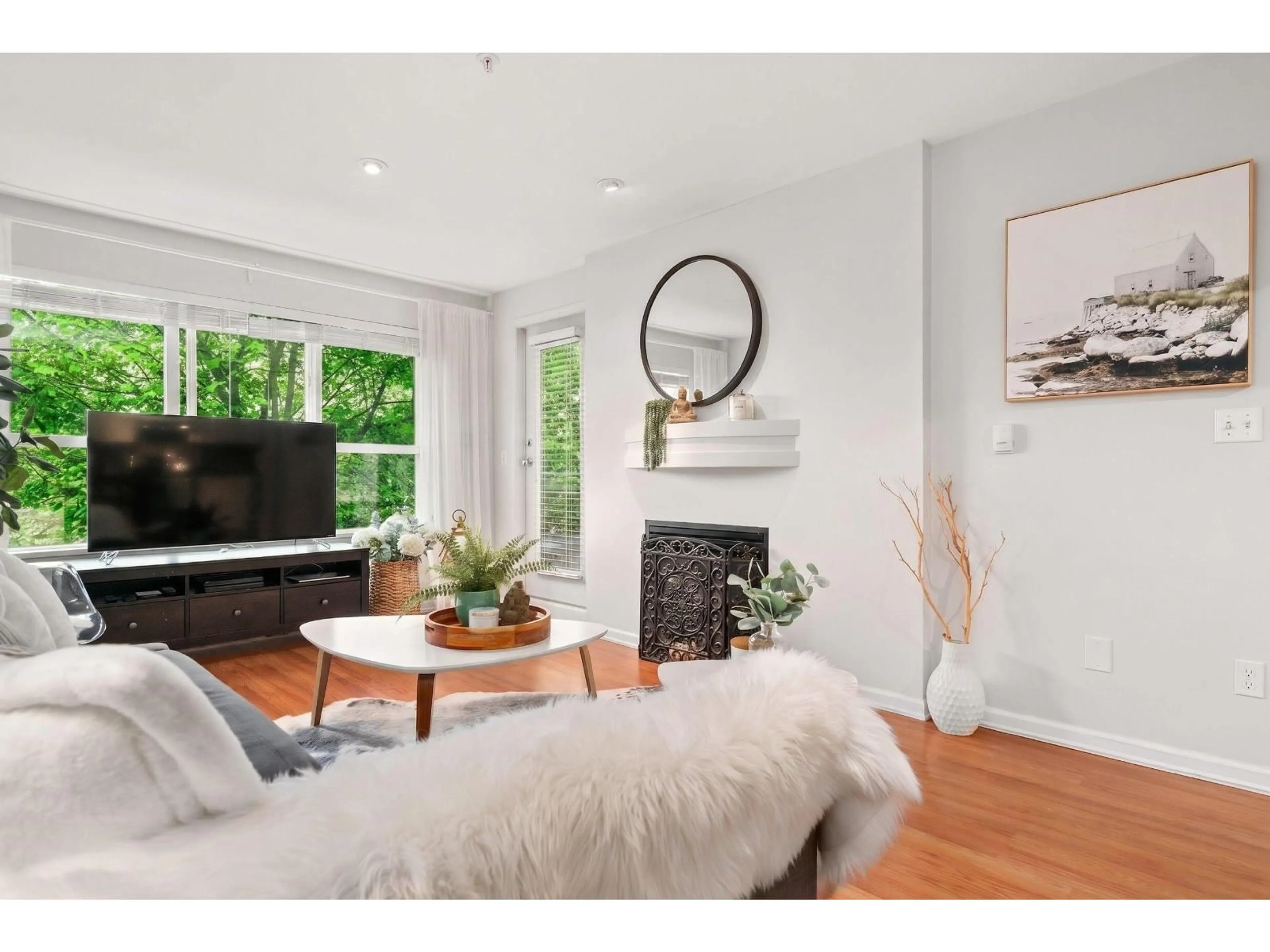 Living room with furniture, wood/laminate floor for 311 - 10188 155 STREET, Surrey British Columbia V3R0R6