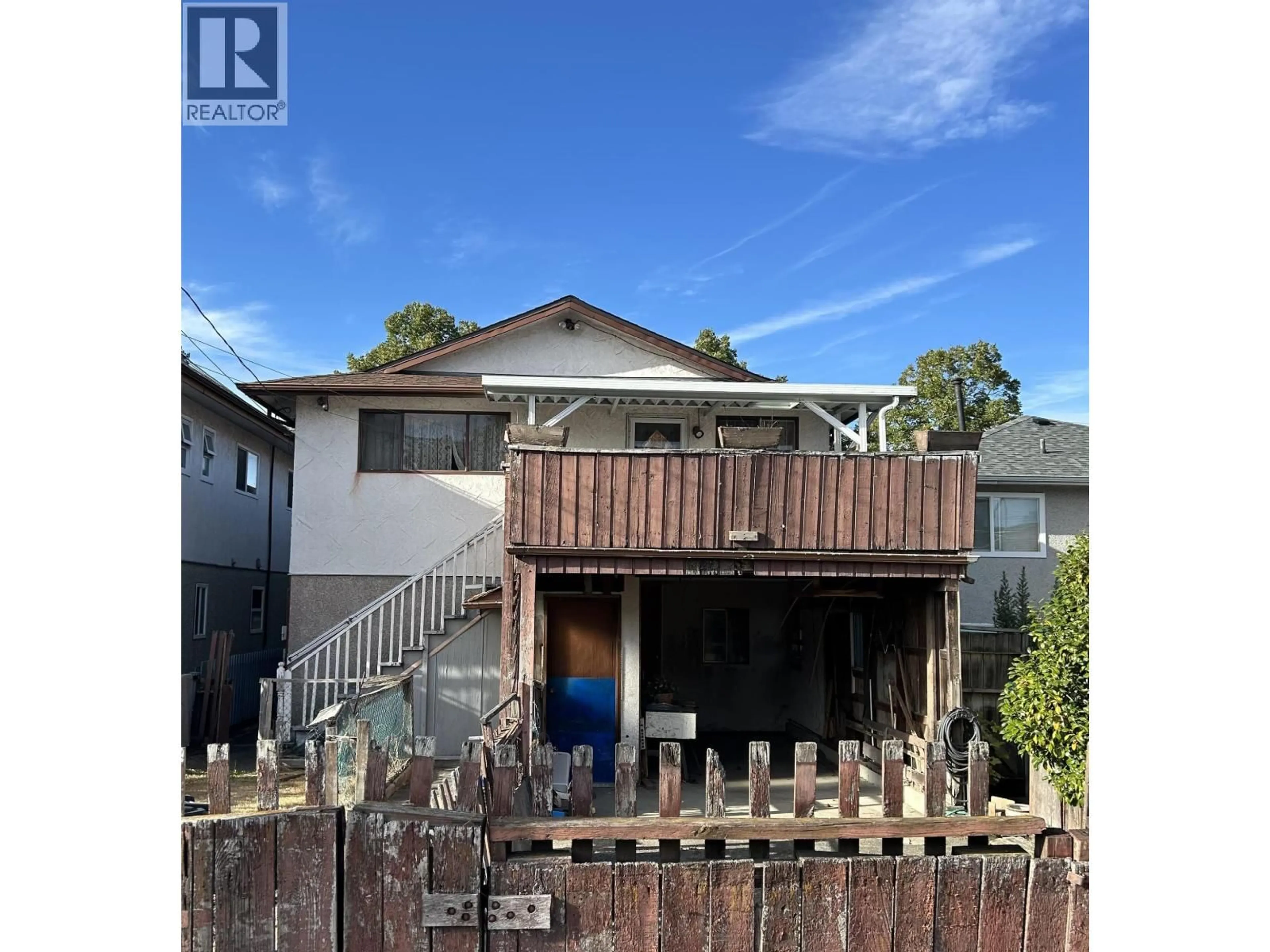 A pic from outside/outdoor area/front of a property/back of a property/a pic from drone, street for 2232 45 AVENUE, Vancouver British Columbia V5P1N8