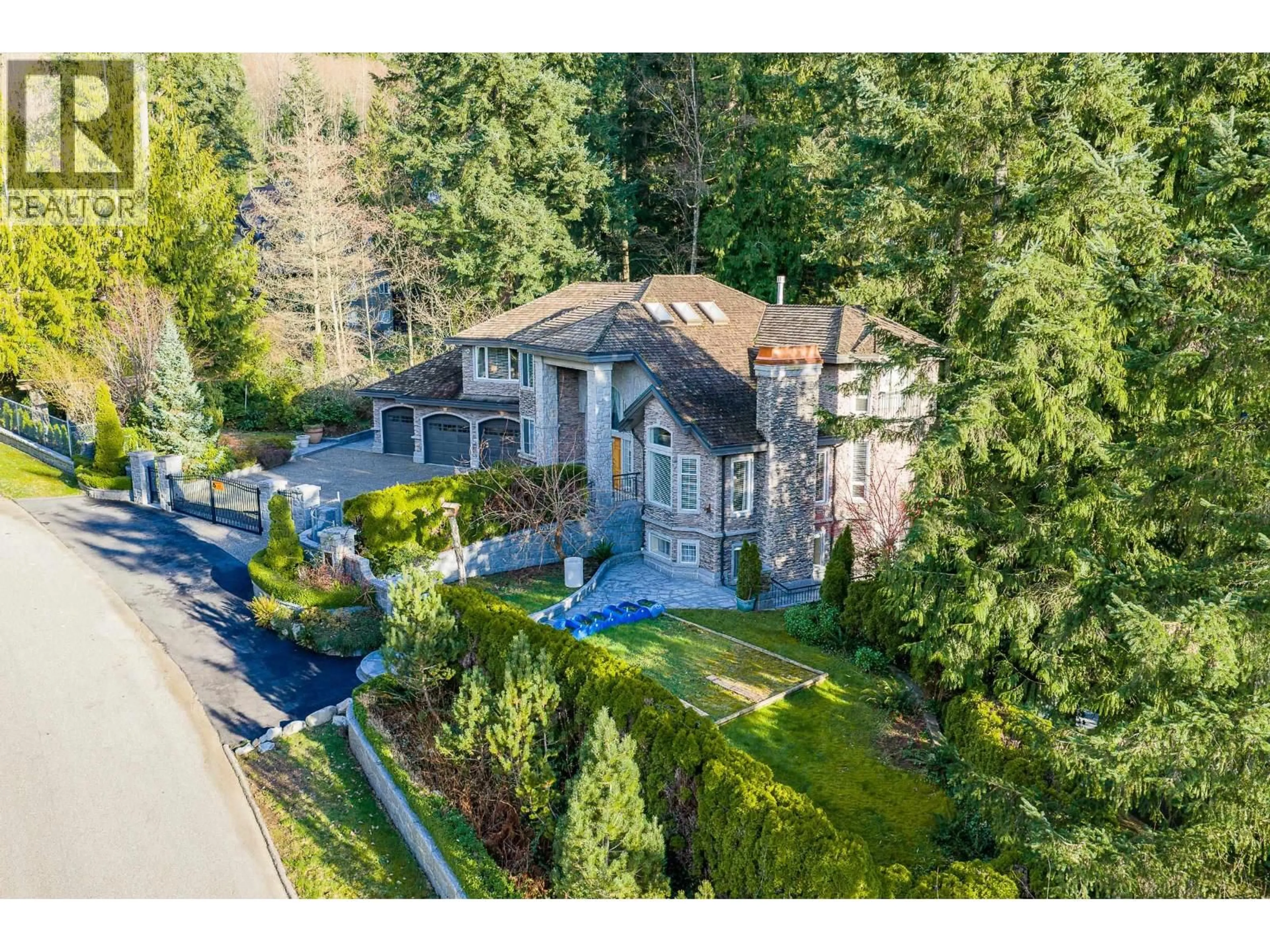A pic from outside/outdoor area/front of a property/back of a property/a pic from drone, unknown for 188 WYNDHAM CRESCENT, Anmore British Columbia V3H4X9