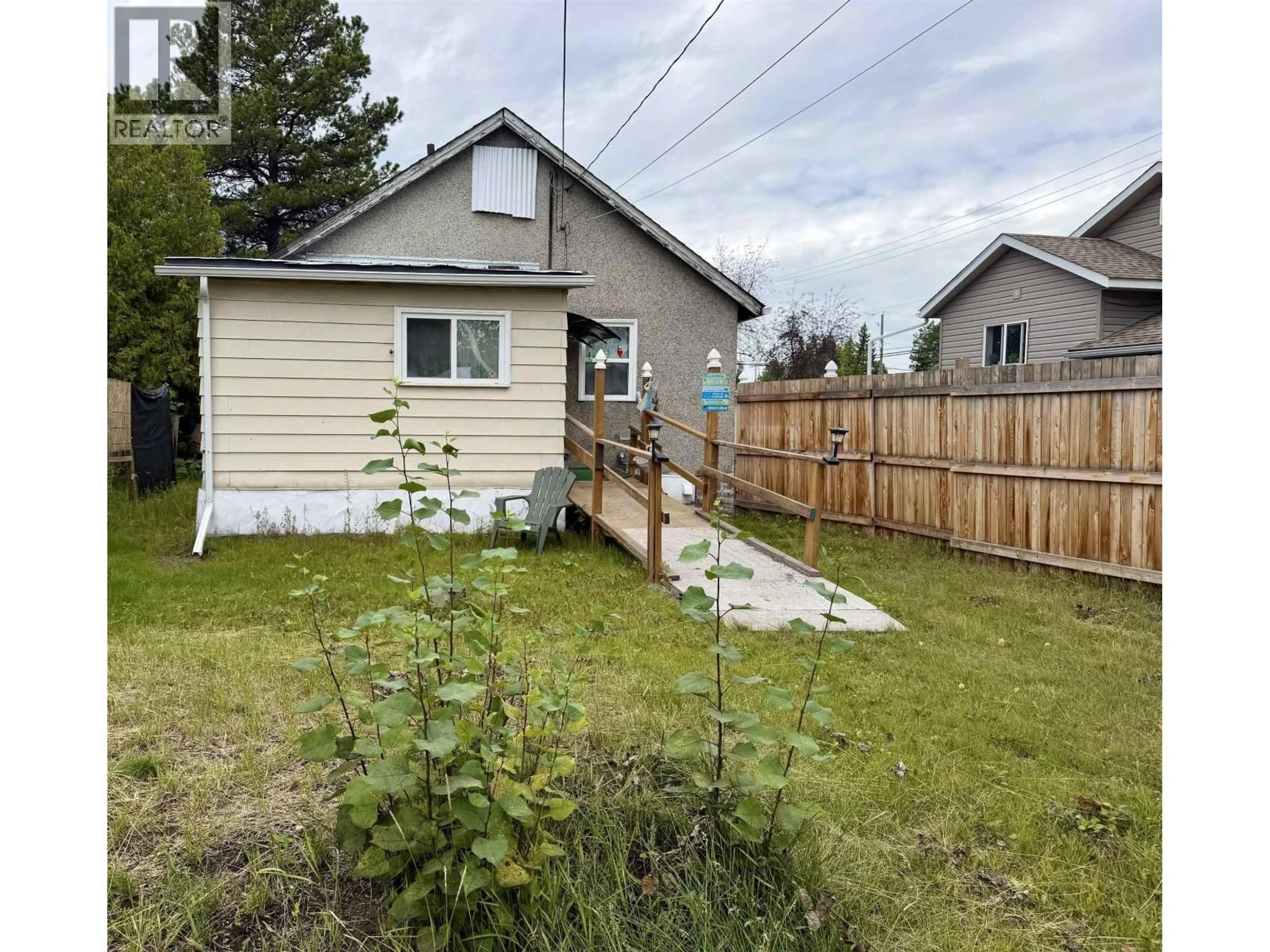 A pic from outside/outdoor area/front of a property/back of a property/a pic from drone, street for 534 IRWIN STREET, Prince George British Columbia V2M2X7
