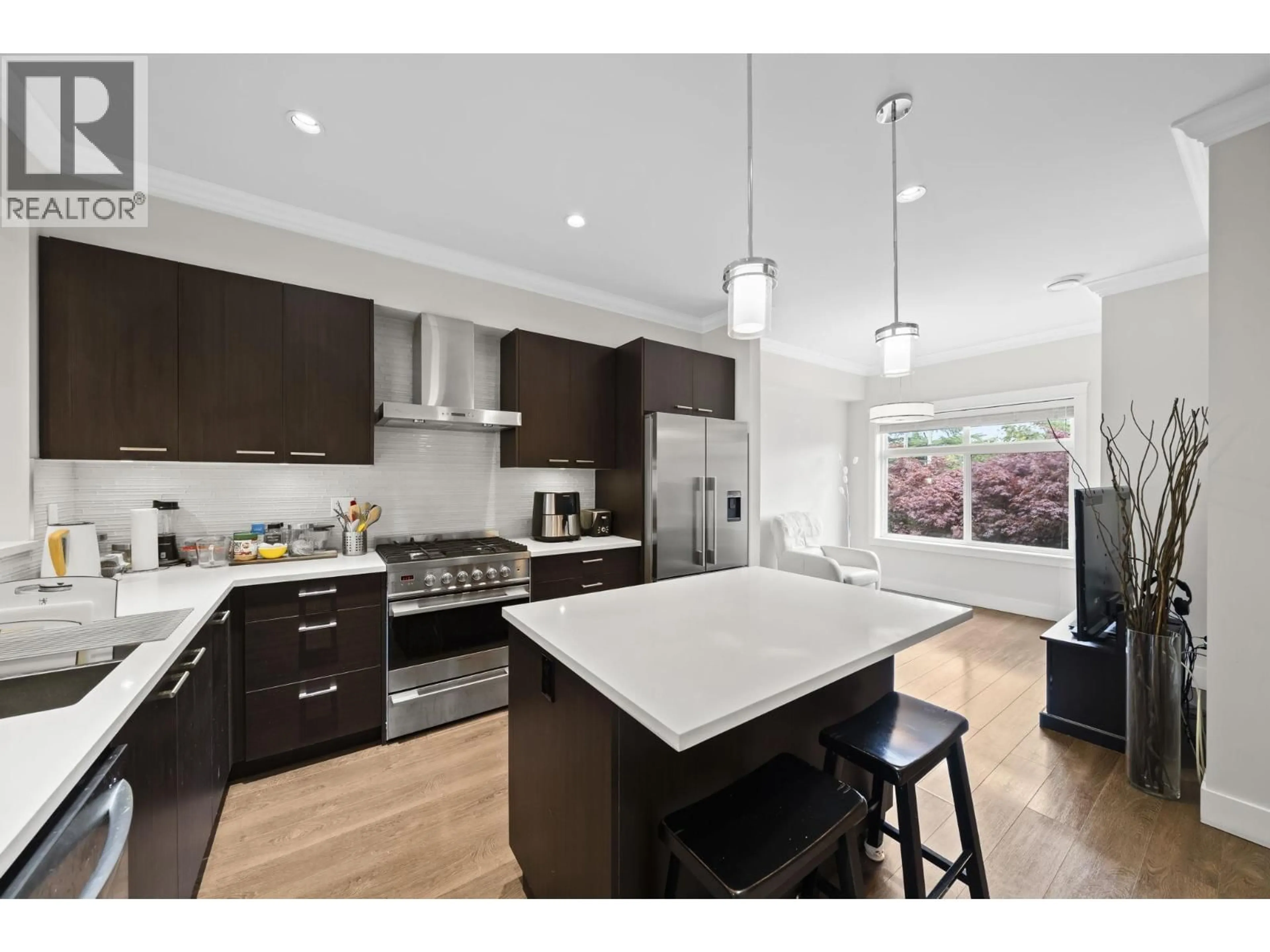 Open concept kitchen, wood/laminate floor for 4 - 5180 BLUNDELL ROAD, Richmond British Columbia V7C1H4