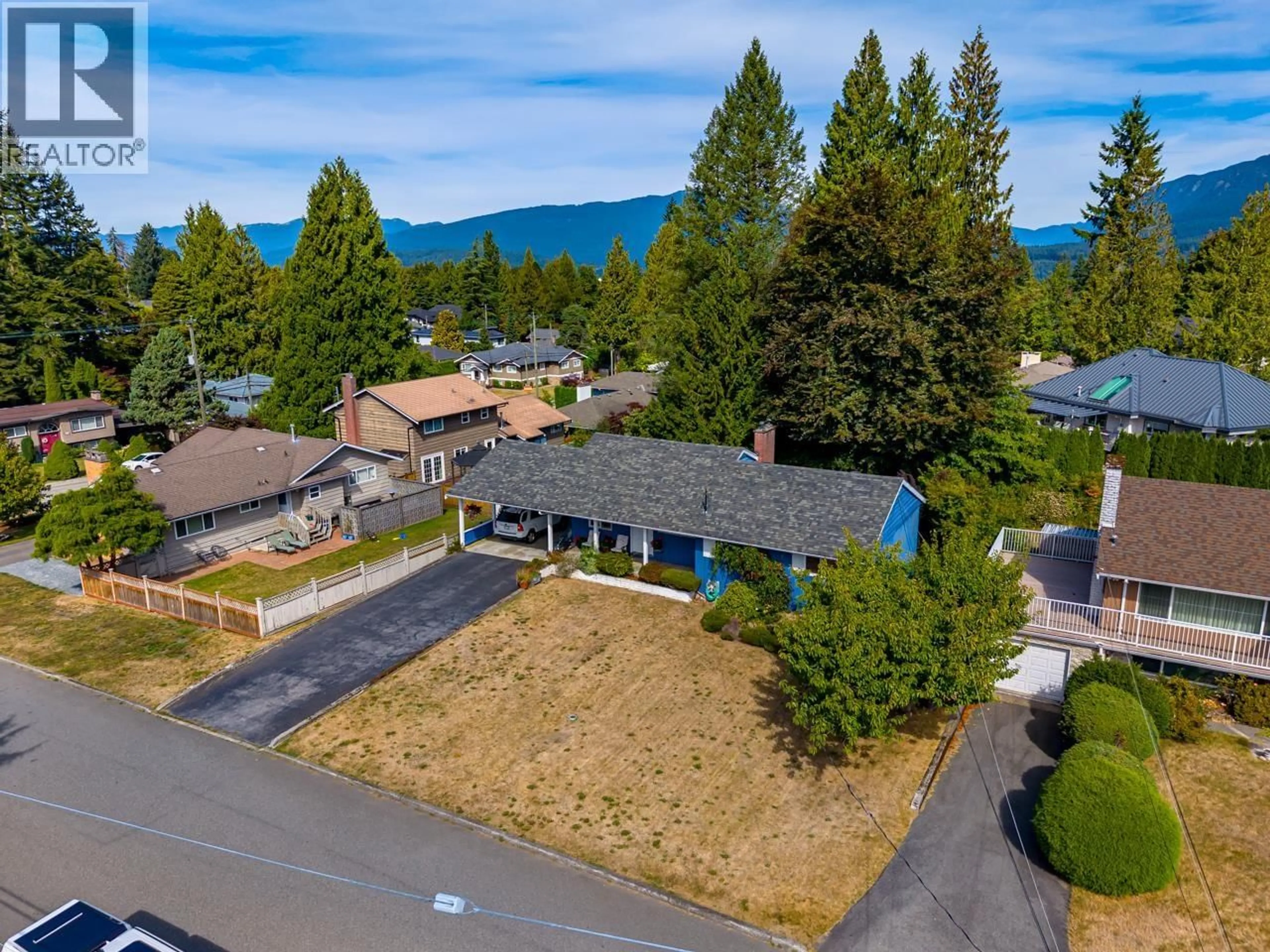 A pic from outside/outdoor area/front of a property/back of a property/a pic from drone, mountain view for 1721 BOWMAN AVENUE, Coquitlam British Columbia V3J6C9