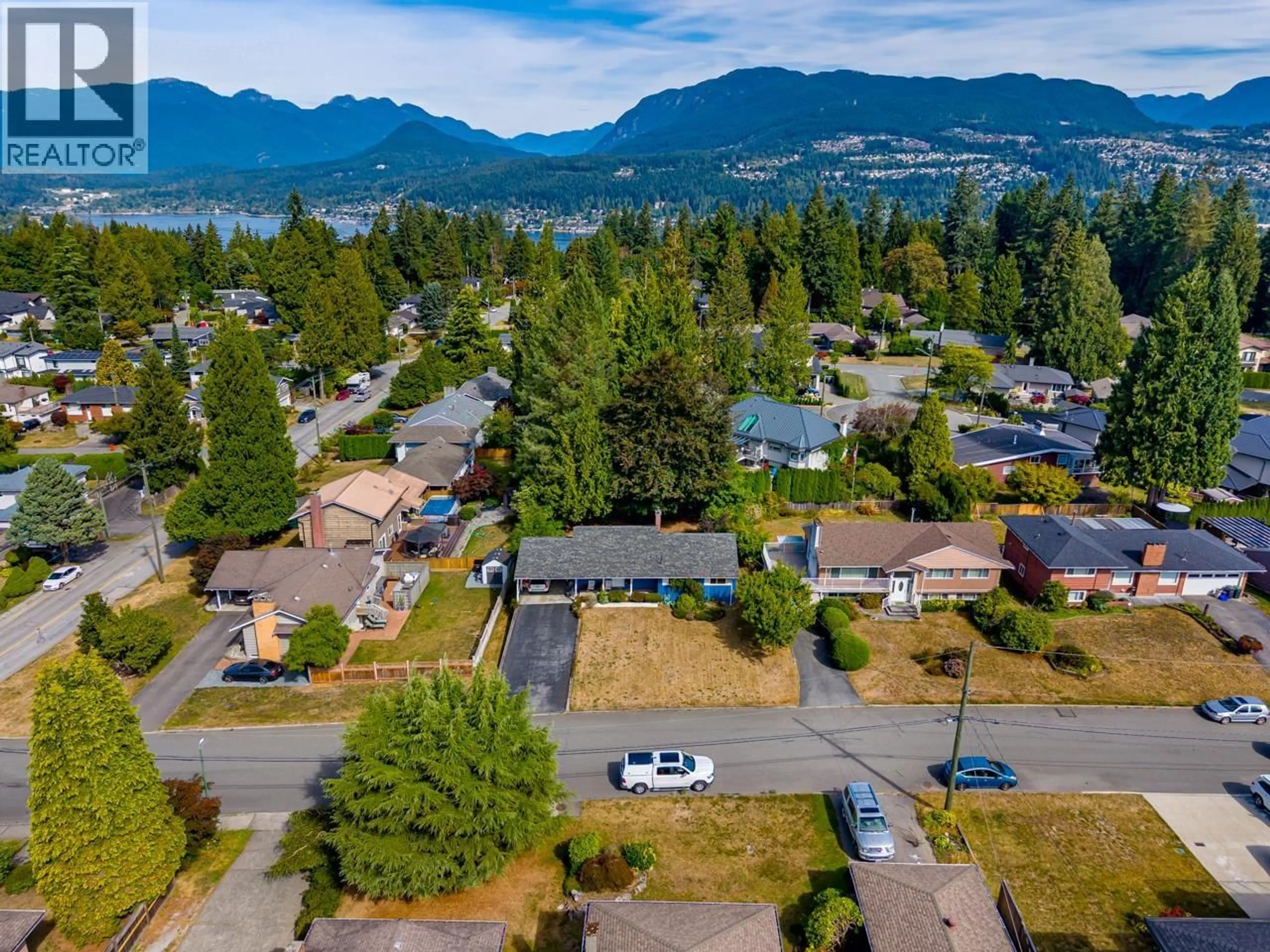 A pic from outside/outdoor area/front of a property/back of a property/a pic from drone, mountain view for 1721 BOWMAN AVENUE, Coquitlam British Columbia V3J6C9