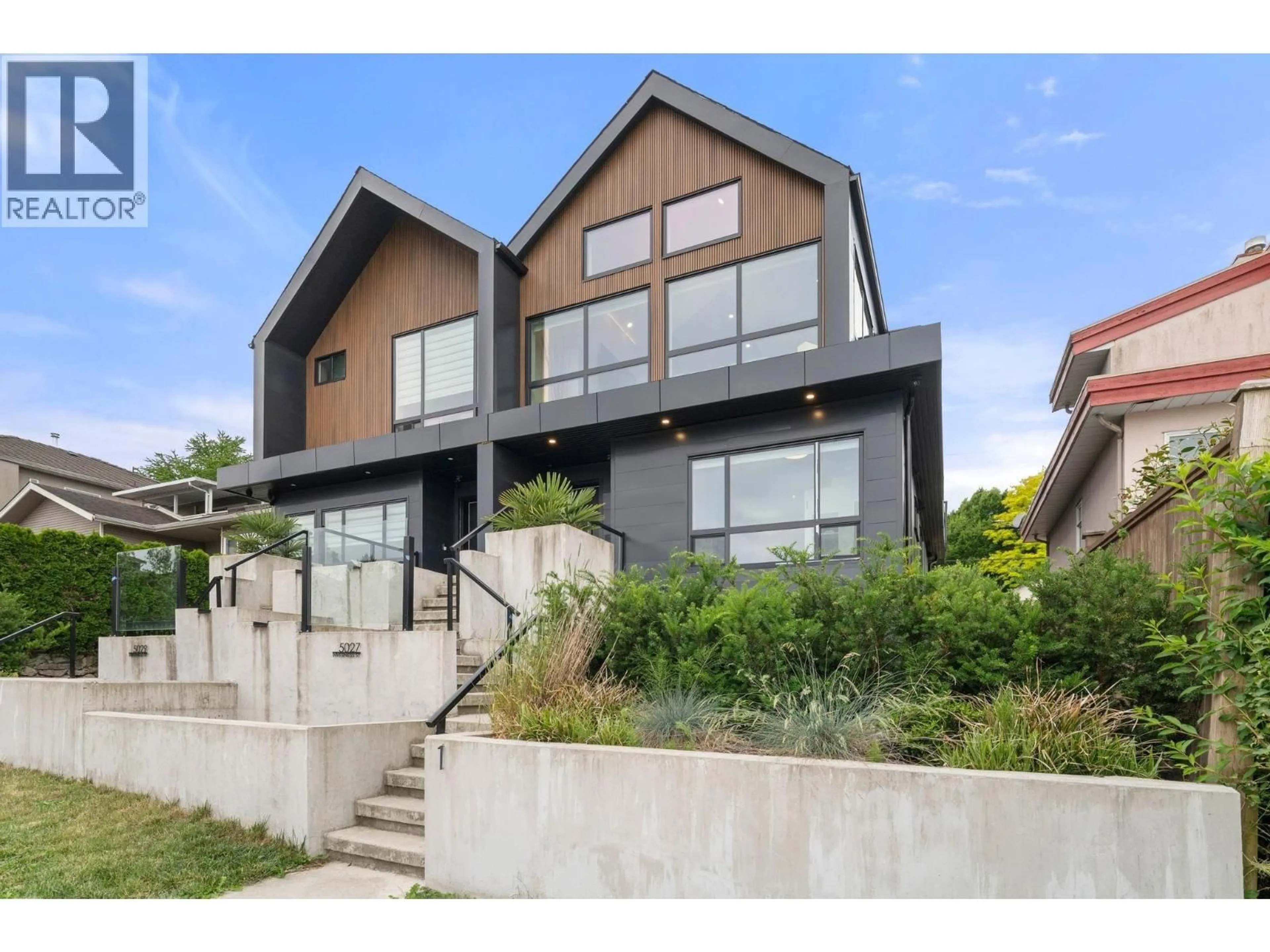 Home with brick exterior material, street for 5027 INVERNESS STREET, Vancouver British Columbia V5W3N7