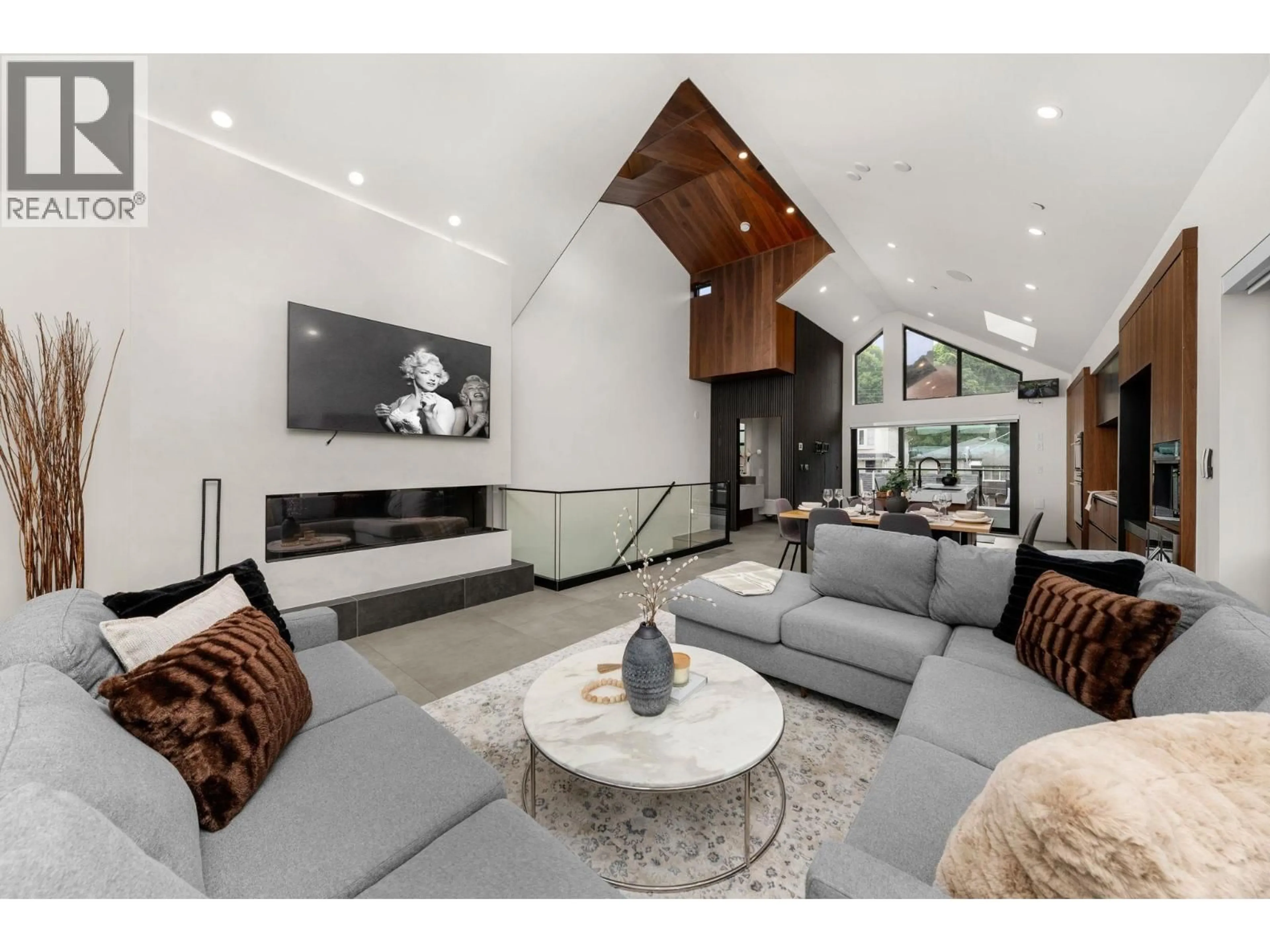 Living room with furniture, unknown for 5027 INVERNESS STREET, Vancouver British Columbia V5W3N7