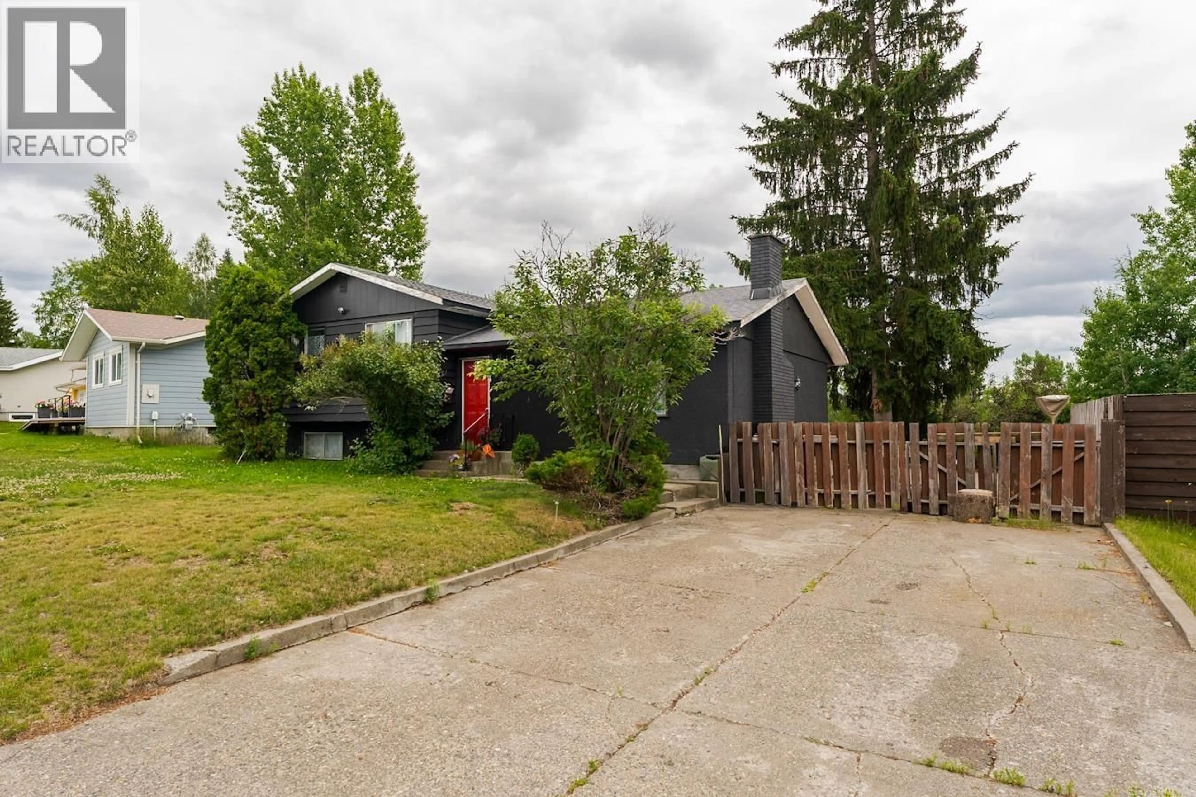 A pic from outside/outdoor area/front of a property/back of a property/a pic from drone, street for 138 MCLEAN DRIVE, Prince George British Columbia V2M4R3