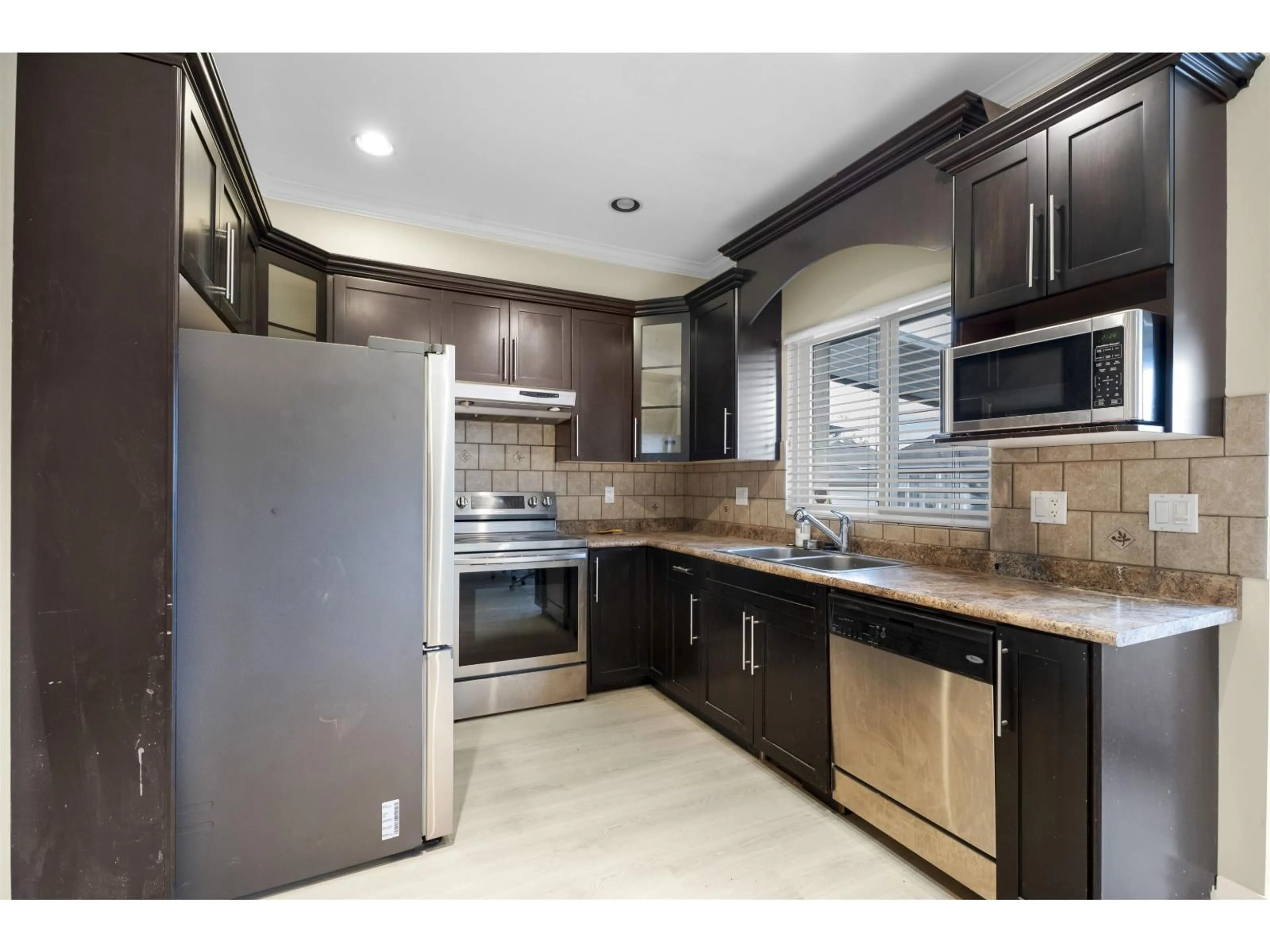 Standard kitchen, ceramic/tile floor for 14850 57 AVENUE, Surrey British Columbia V3S8W3