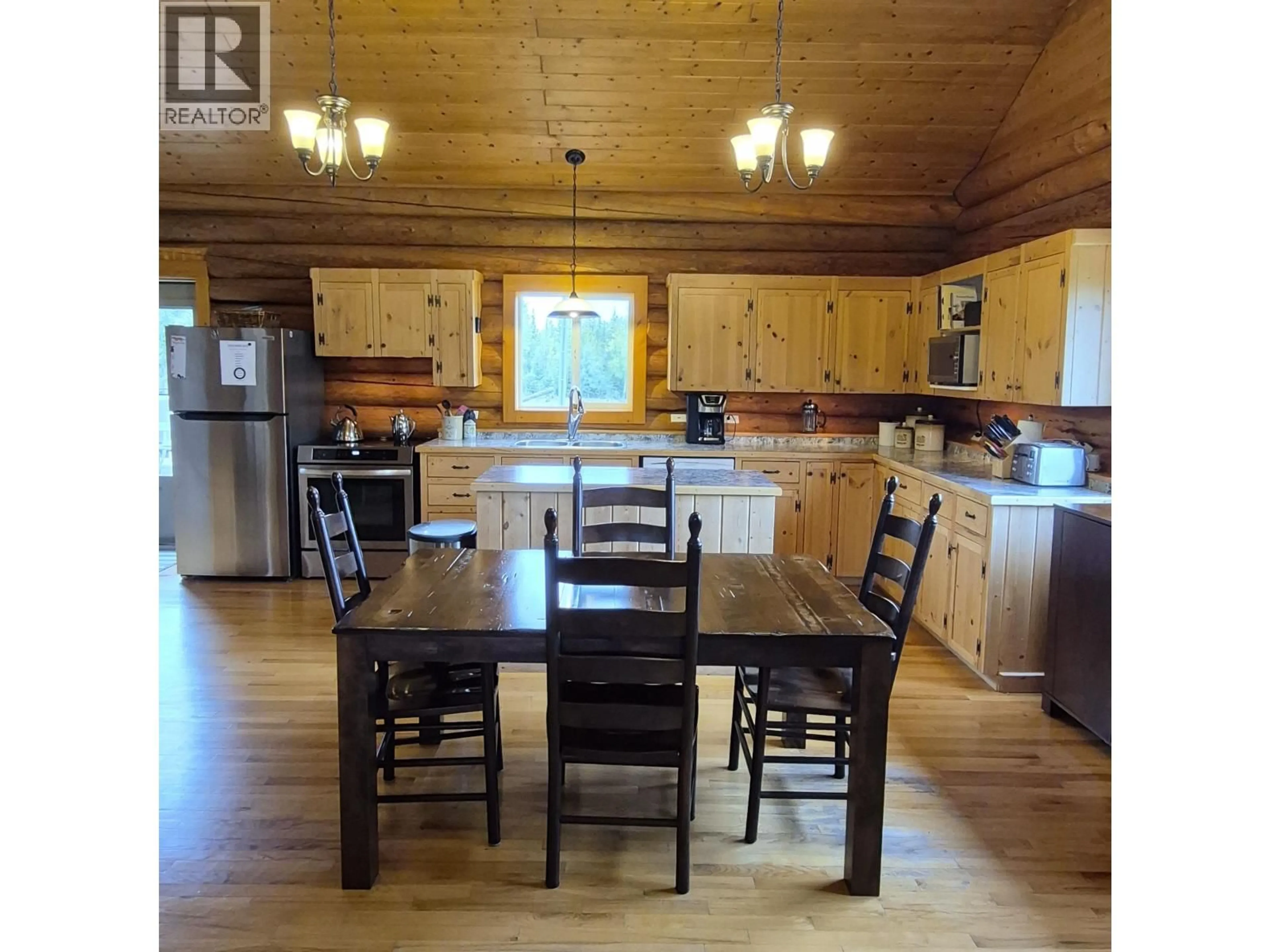 Open concept kitchen, wood/laminate floor for 17849 LANGSTON ROAD, Vanderhoof British Columbia V0J3A1