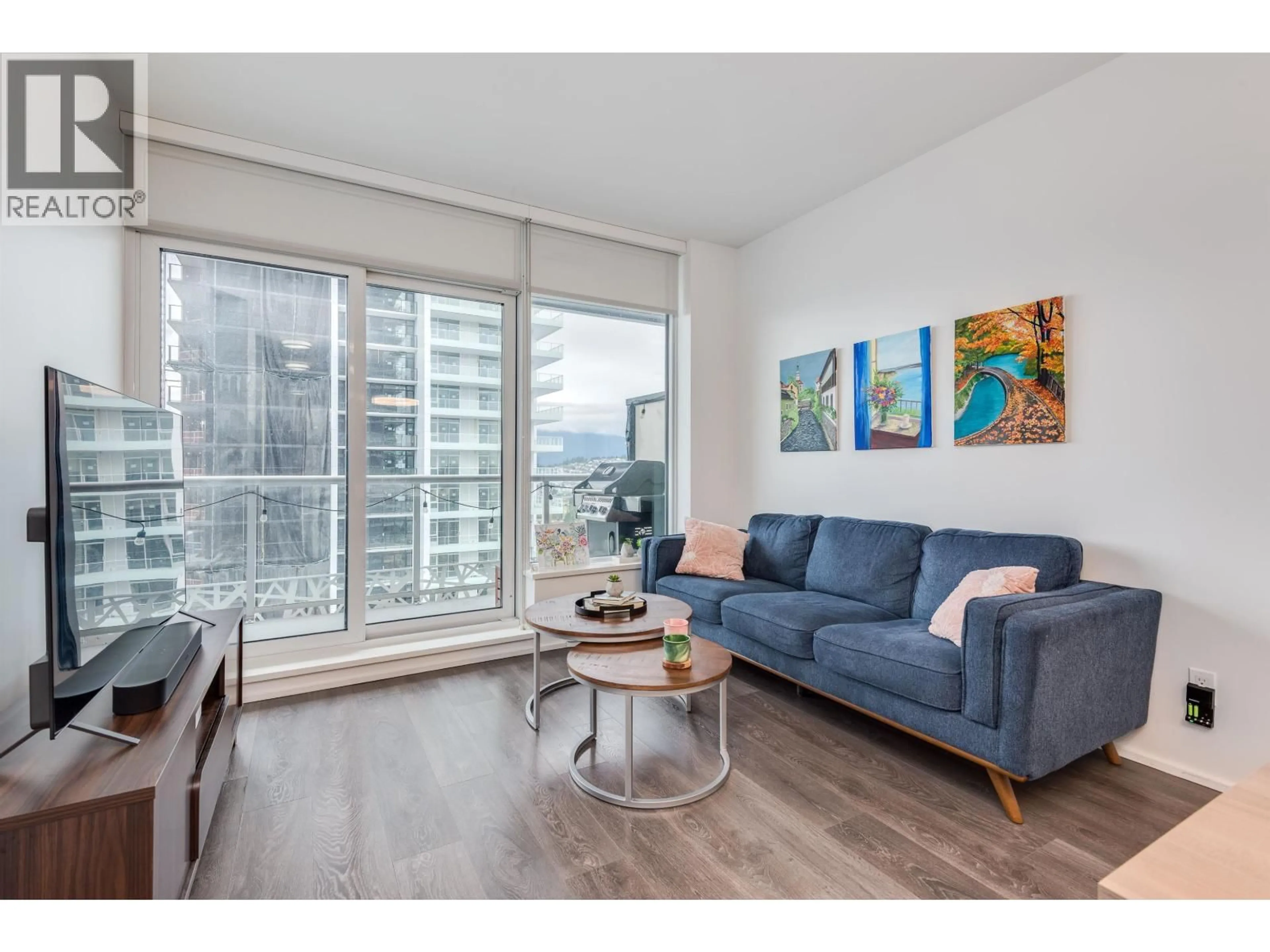 Living room with furniture, wood/laminate floor for 4212 - 4510 HALIFAX WAY, Burnaby British Columbia V5C0K4