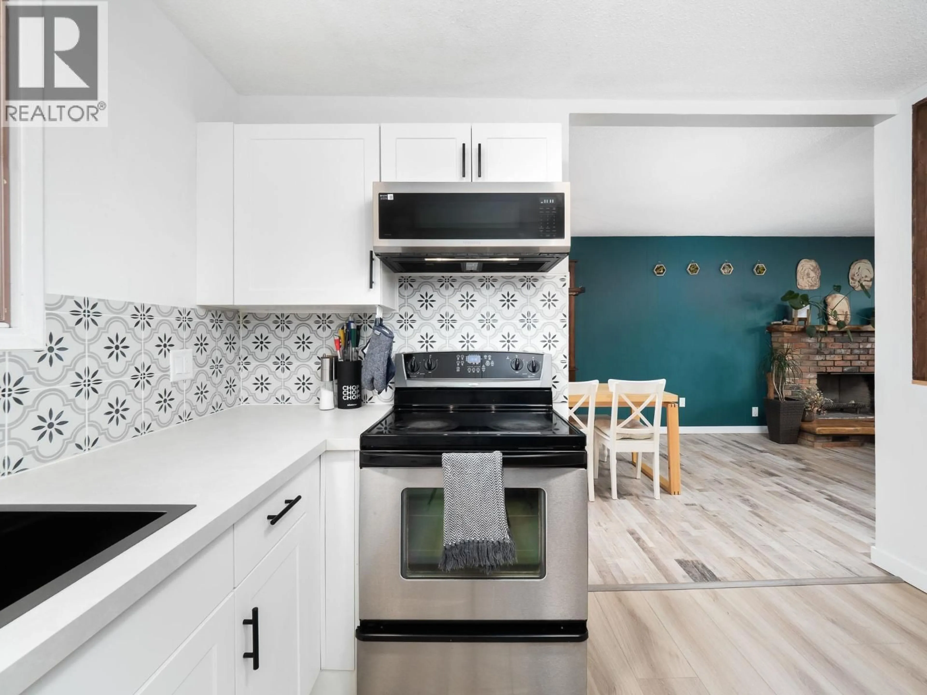 Open concept kitchen, ceramic/tile floor for 2177 SUSSEX LANE, Prince George British Columbia V2K3J1