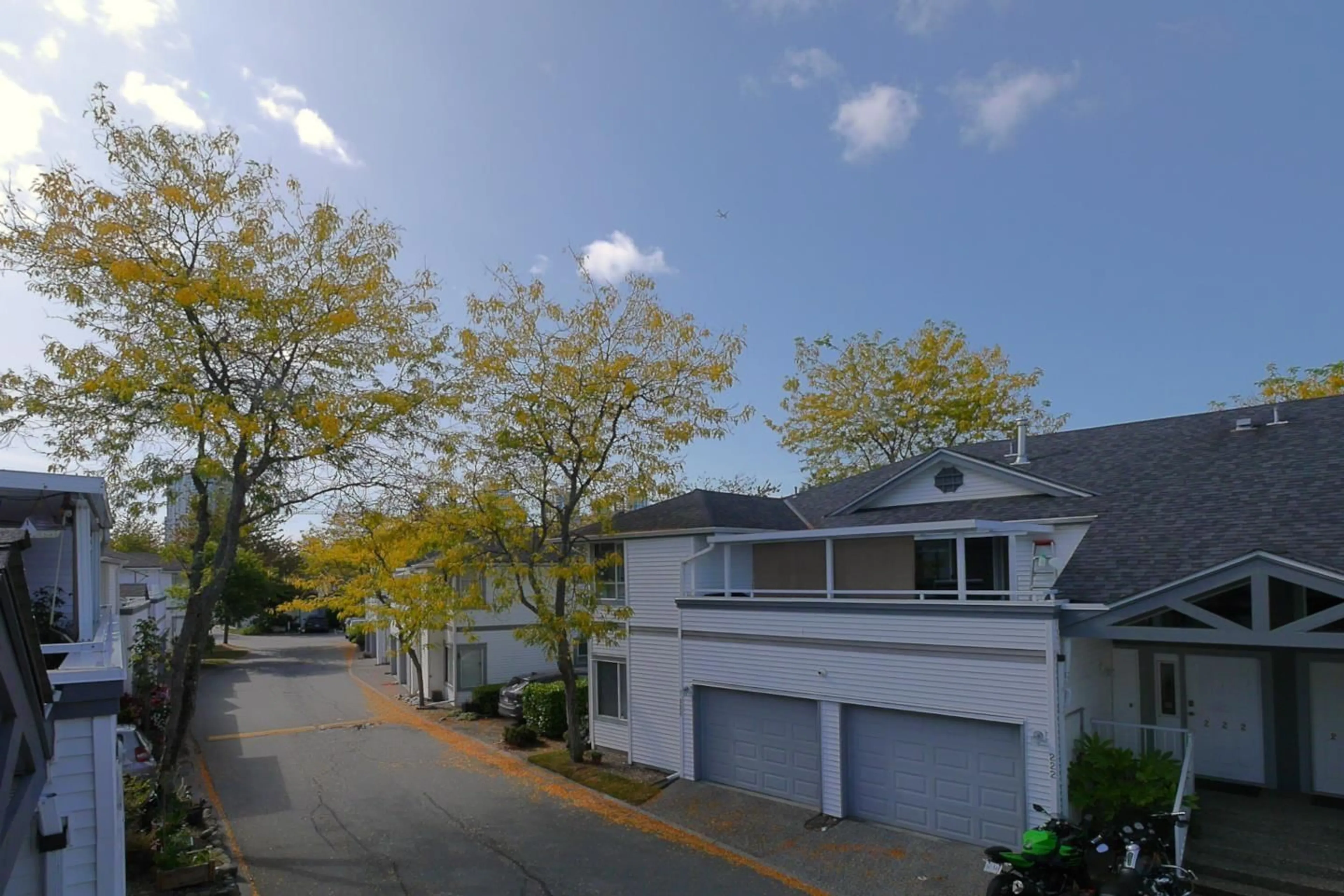 A pic from outside/outdoor area/front of a property/back of a property/a pic from drone, street for 225 - 13895 102 AVENUE, Surrey British Columbia V3T1P2