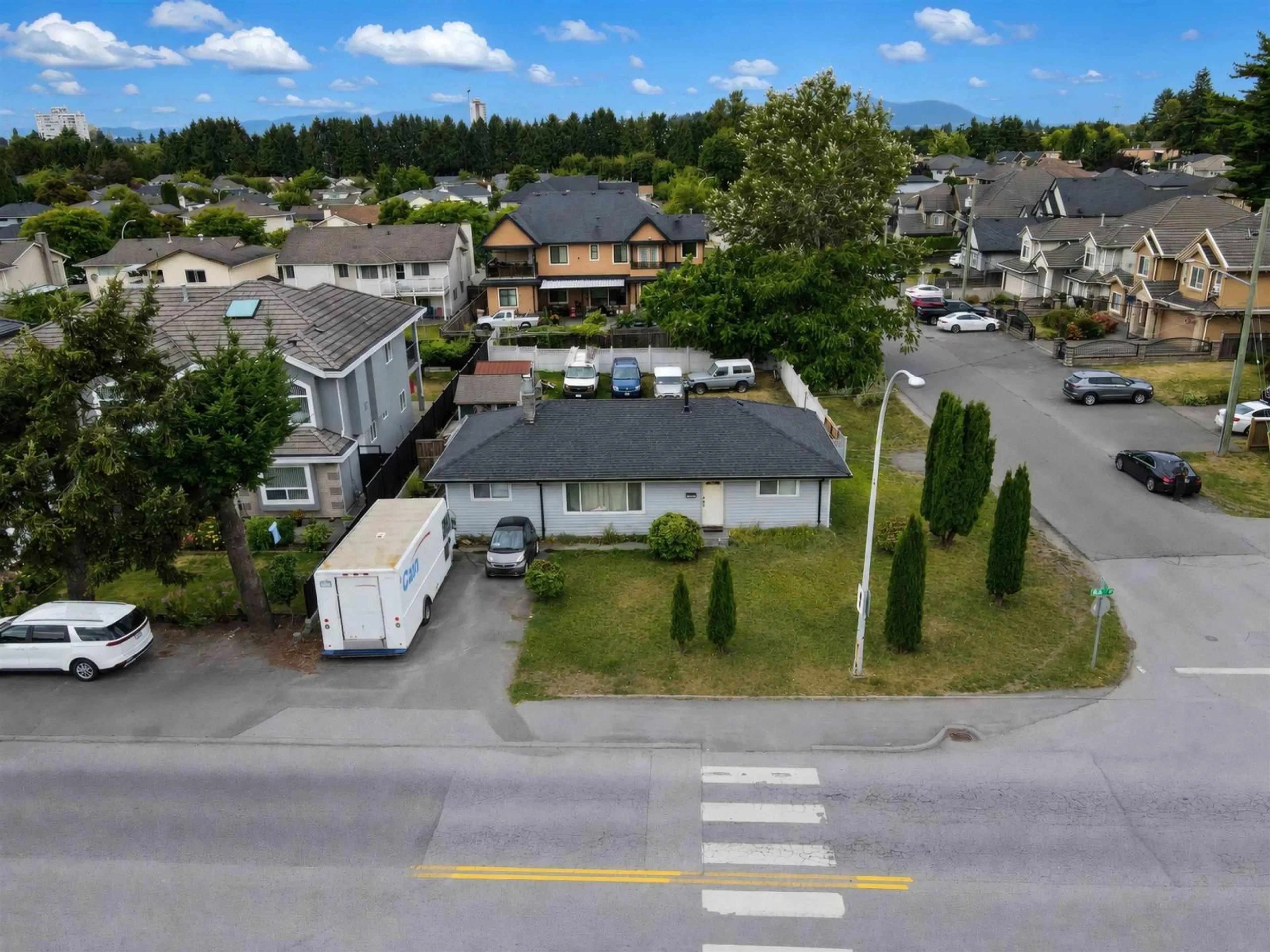 A pic from outside/outdoor area/front of a property/back of a property/a pic from drone, street for 12141 84 AVENUE, Surrey British Columbia V3W6K6