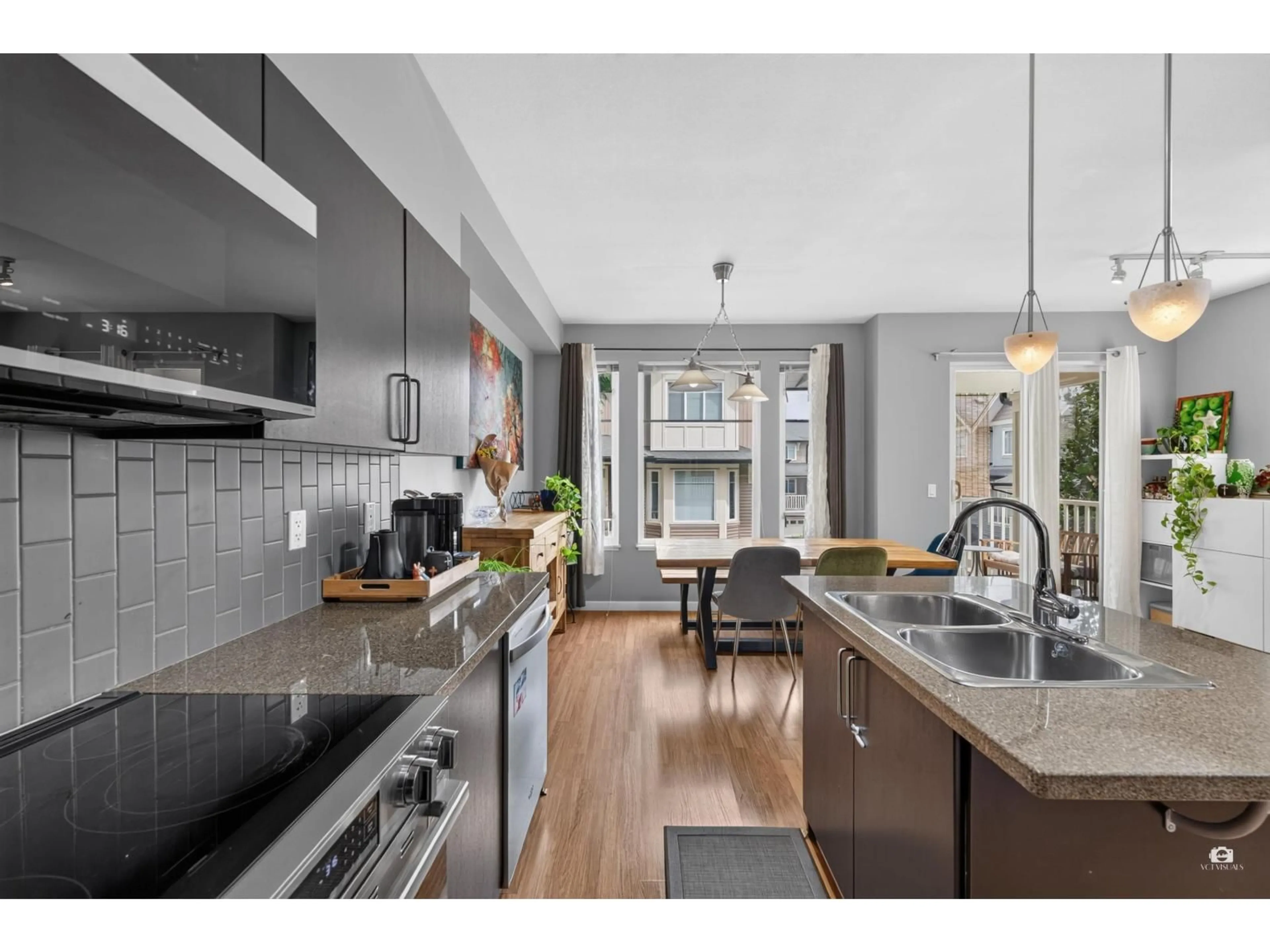 Open concept kitchen, unknown for 102 - 6575 192 STREET, Surrey British Columbia V4N5T8