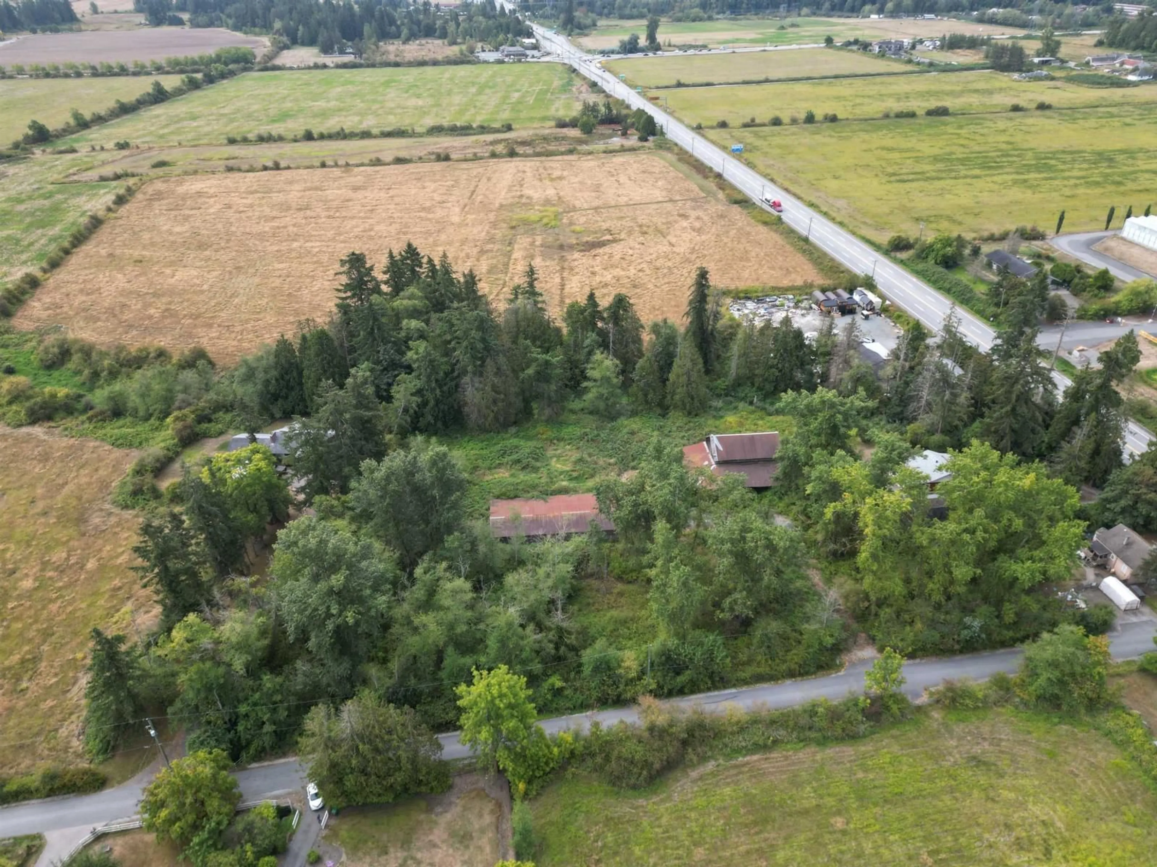 A pic from outside/outdoor area/front of a property/back of a property/a pic from drone, forest/trees view for 17720 12 AVENUE, Surrey British Columbia V3Z9R9
