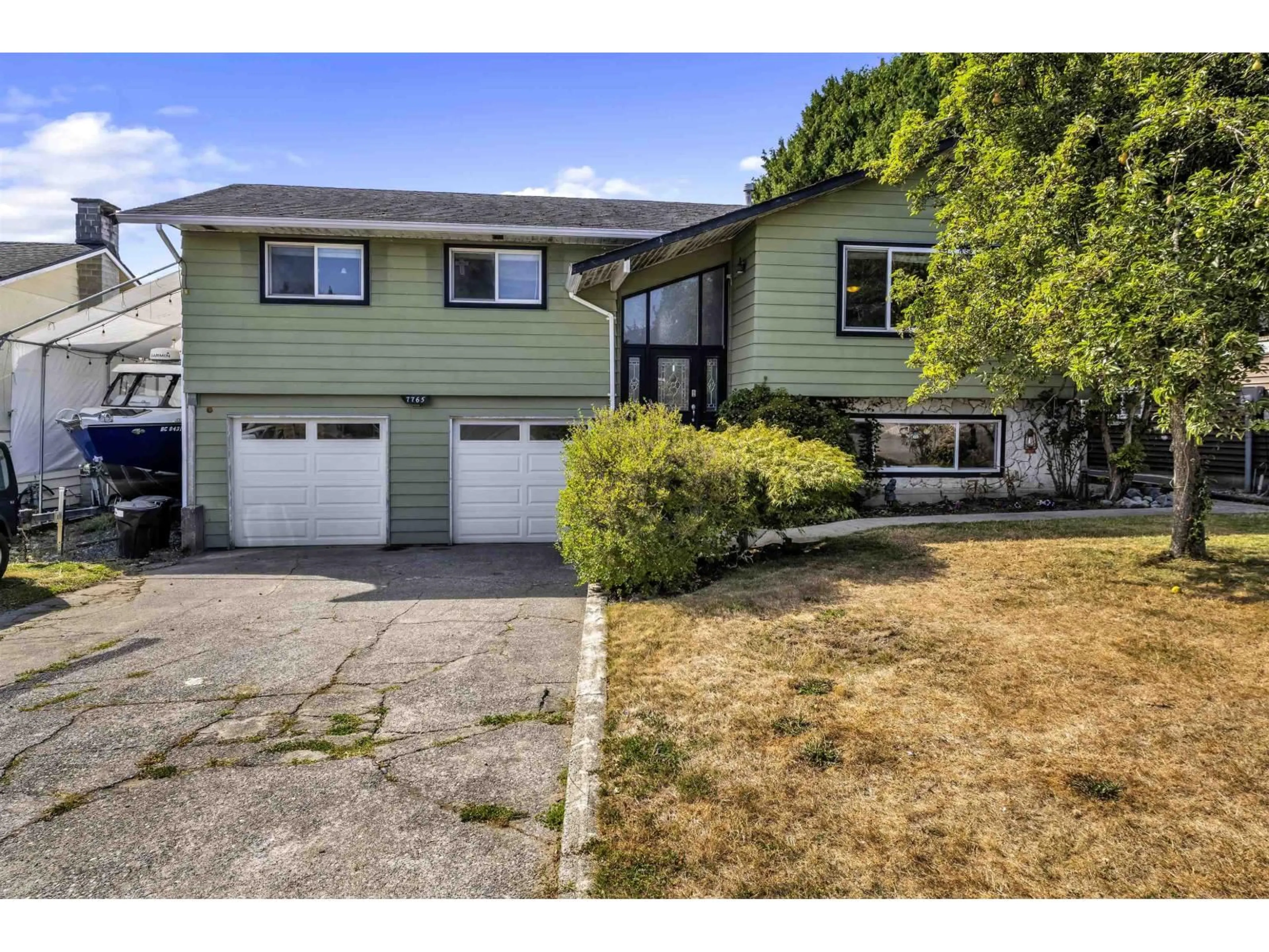 Home with vinyl exterior material, street for 7765 114A STREET, Delta British Columbia V4C7E5