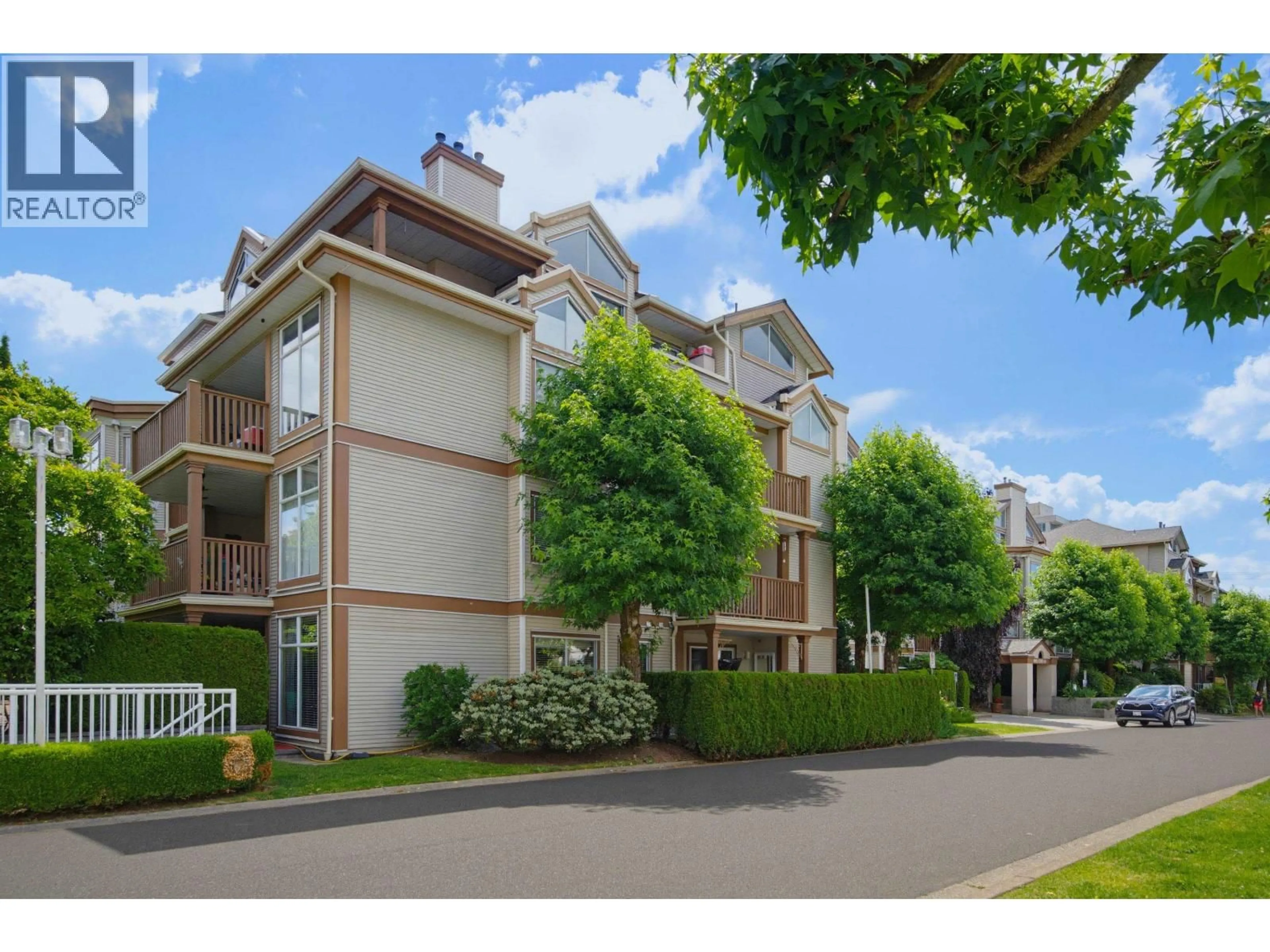 A pic from outside/outdoor area/front of a property/back of a property/a pic from drone, street for 206 - 19131 FORD ROAD, Pitt Meadows British Columbia V3Y2R5