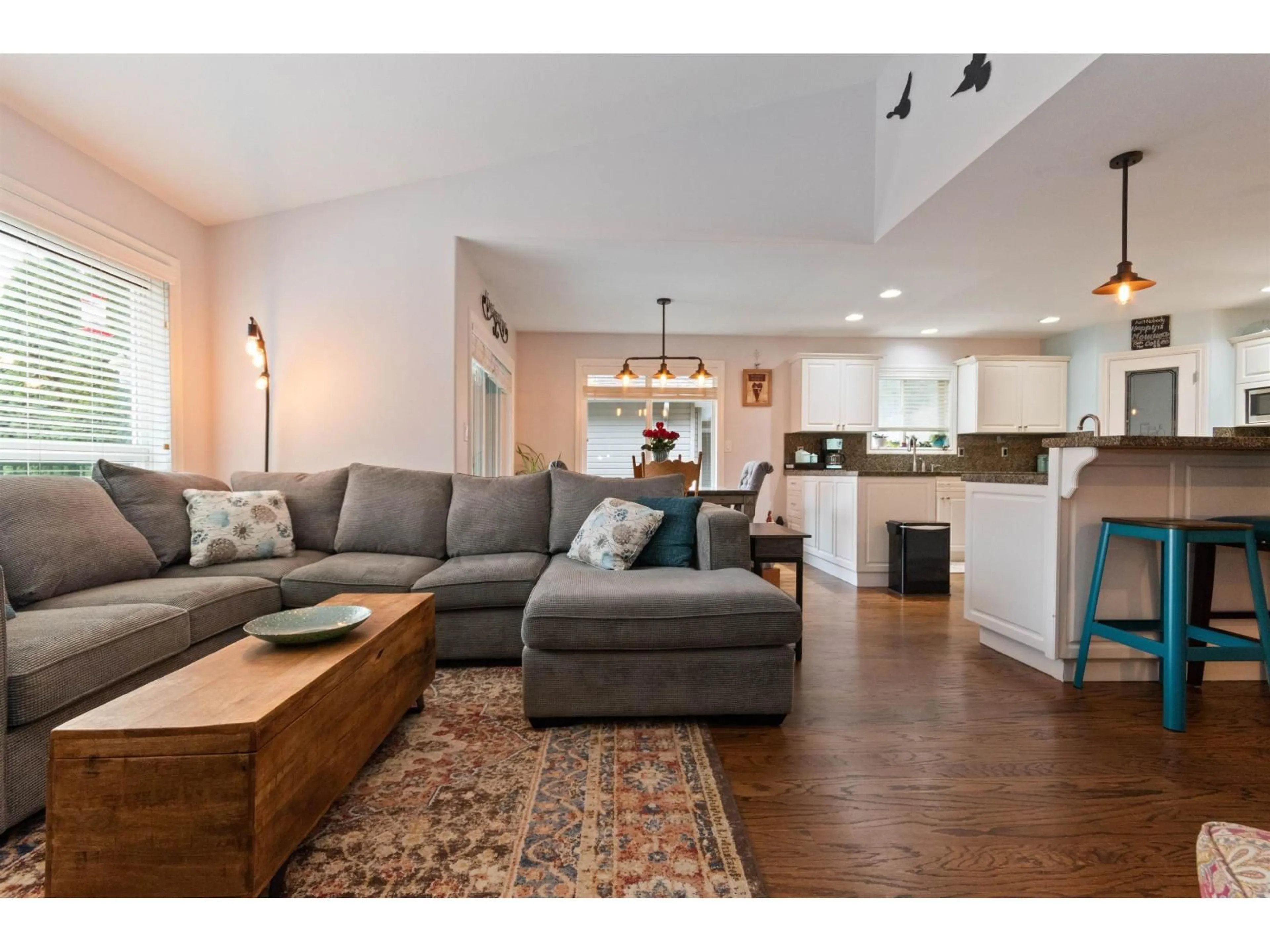Living room with furniture, wood/laminate floor for 246 BALSAM AVENUE, Harrison Hot Springs British Columbia V0M1K0