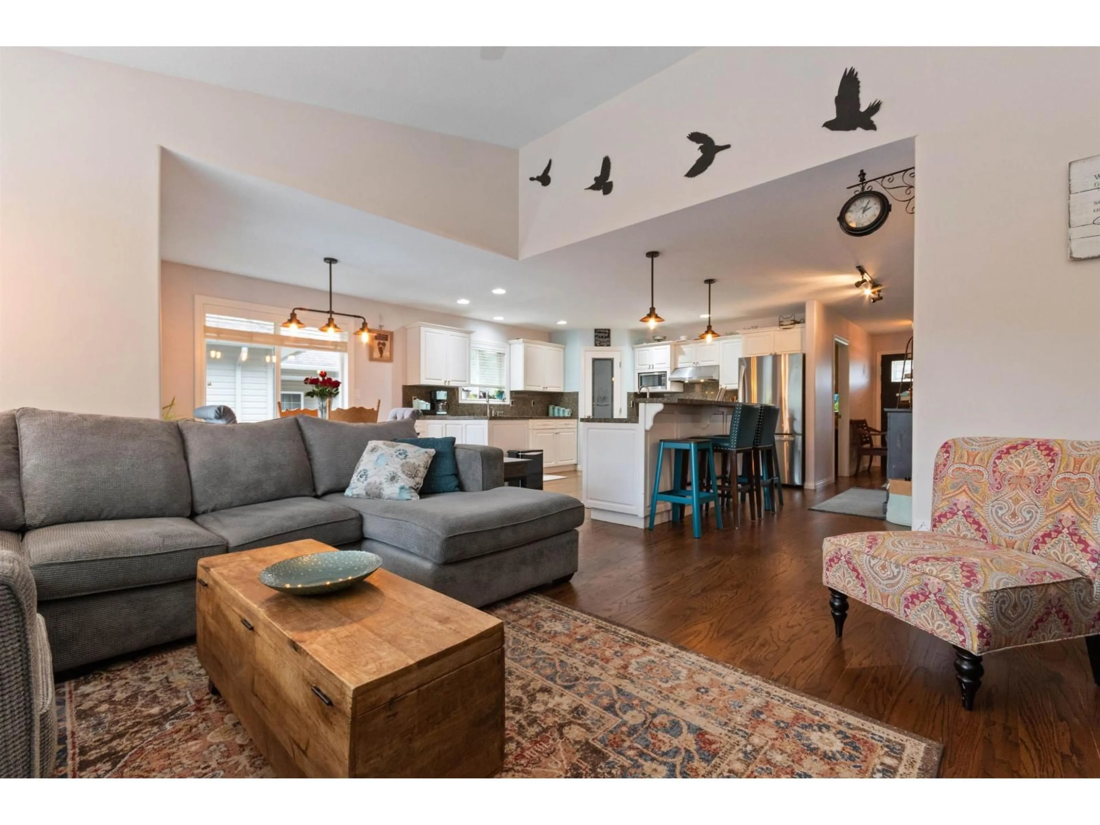 Open concept kitchen, wood/laminate floor for 246 BALSAM AVENUE, Harrison Hot Springs British Columbia V0M1K0