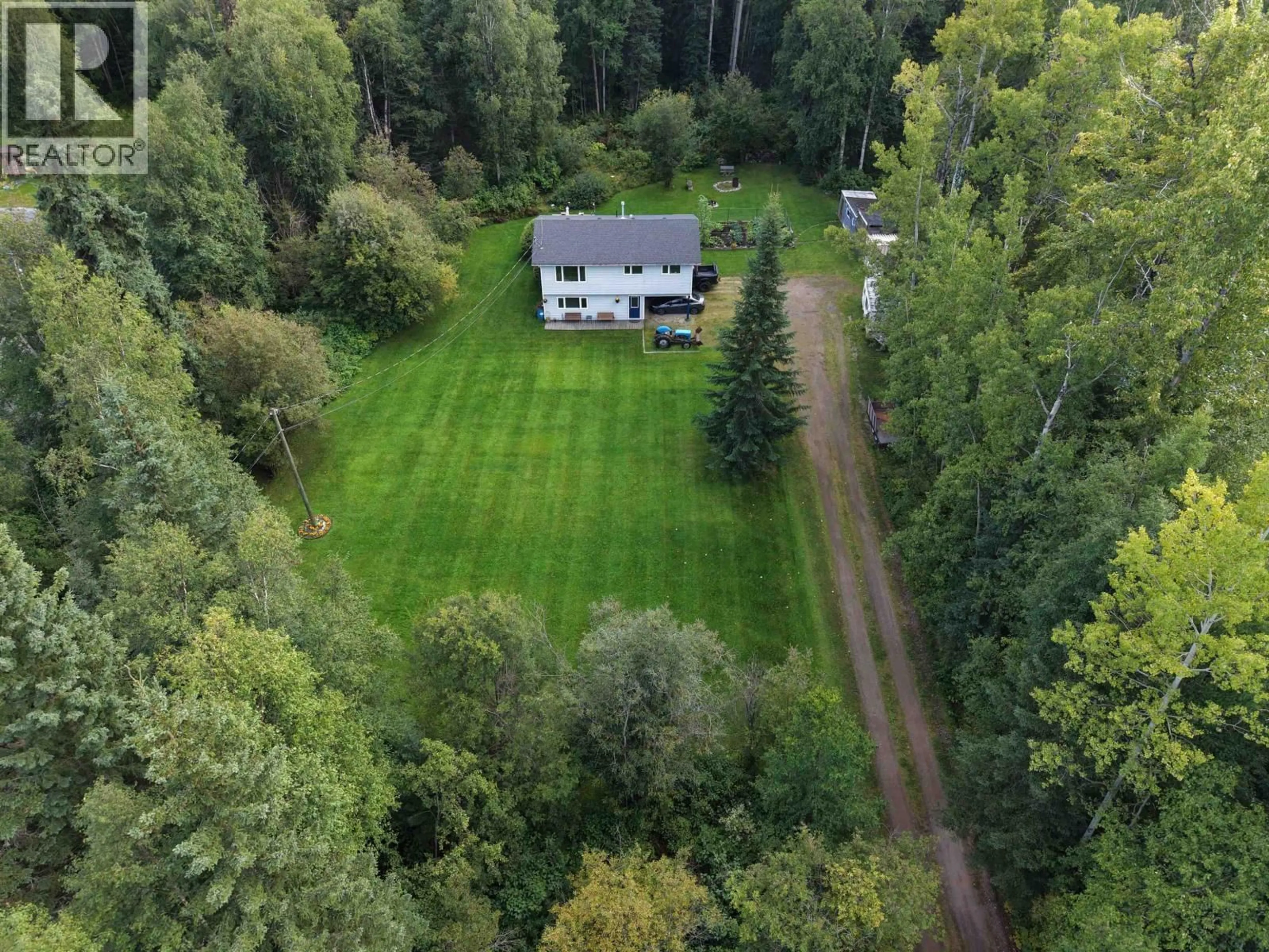 A pic from outside/outdoor area/front of a property/back of a property/a pic from drone, forest/trees view for 5027 SOOKE ROAD, Prince George British Columbia V2K5V1