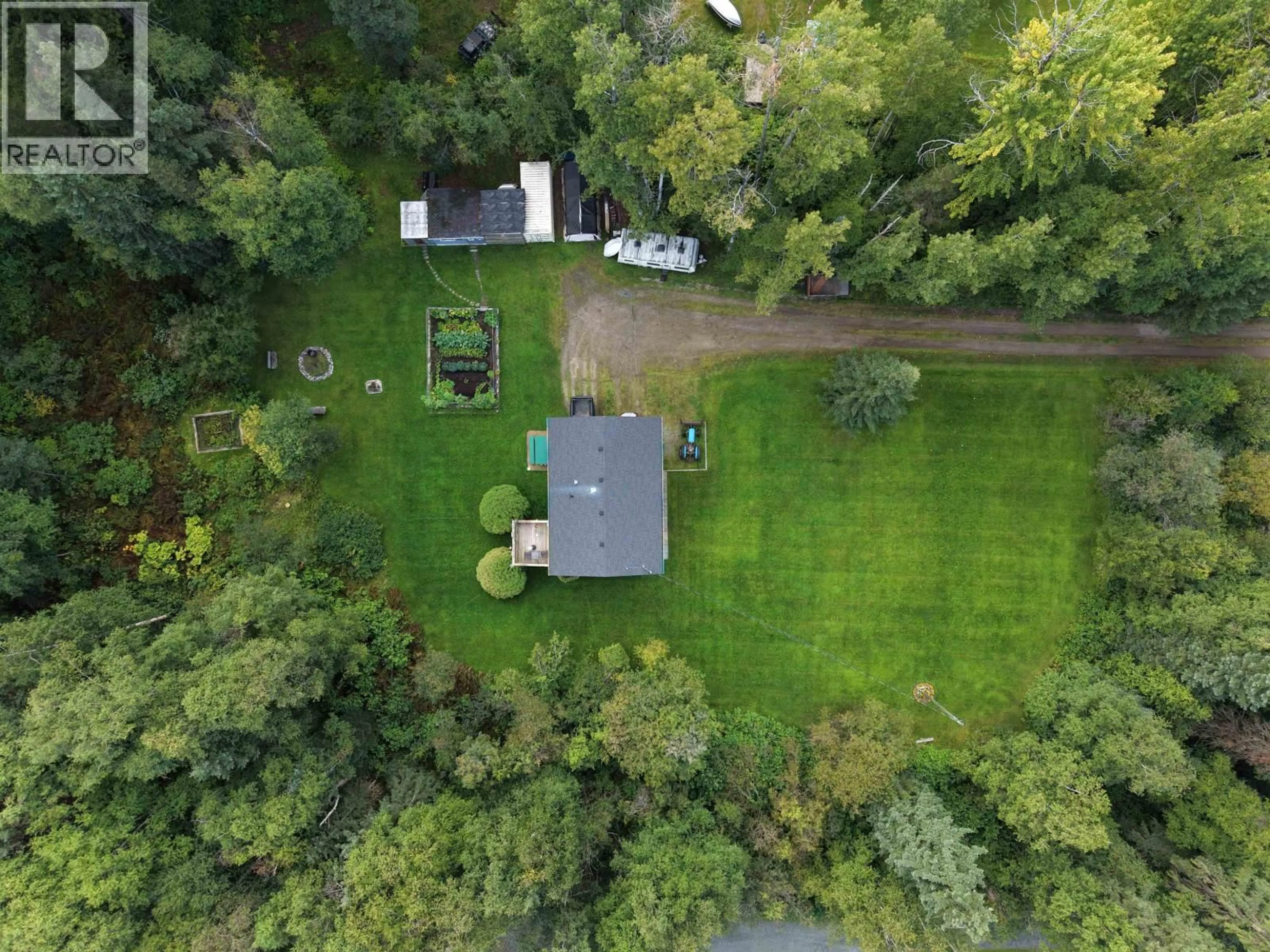 A pic from outside/outdoor area/front of a property/back of a property/a pic from drone, forest/trees view for 5027 SOOKE ROAD, Prince George British Columbia V2K5V1
