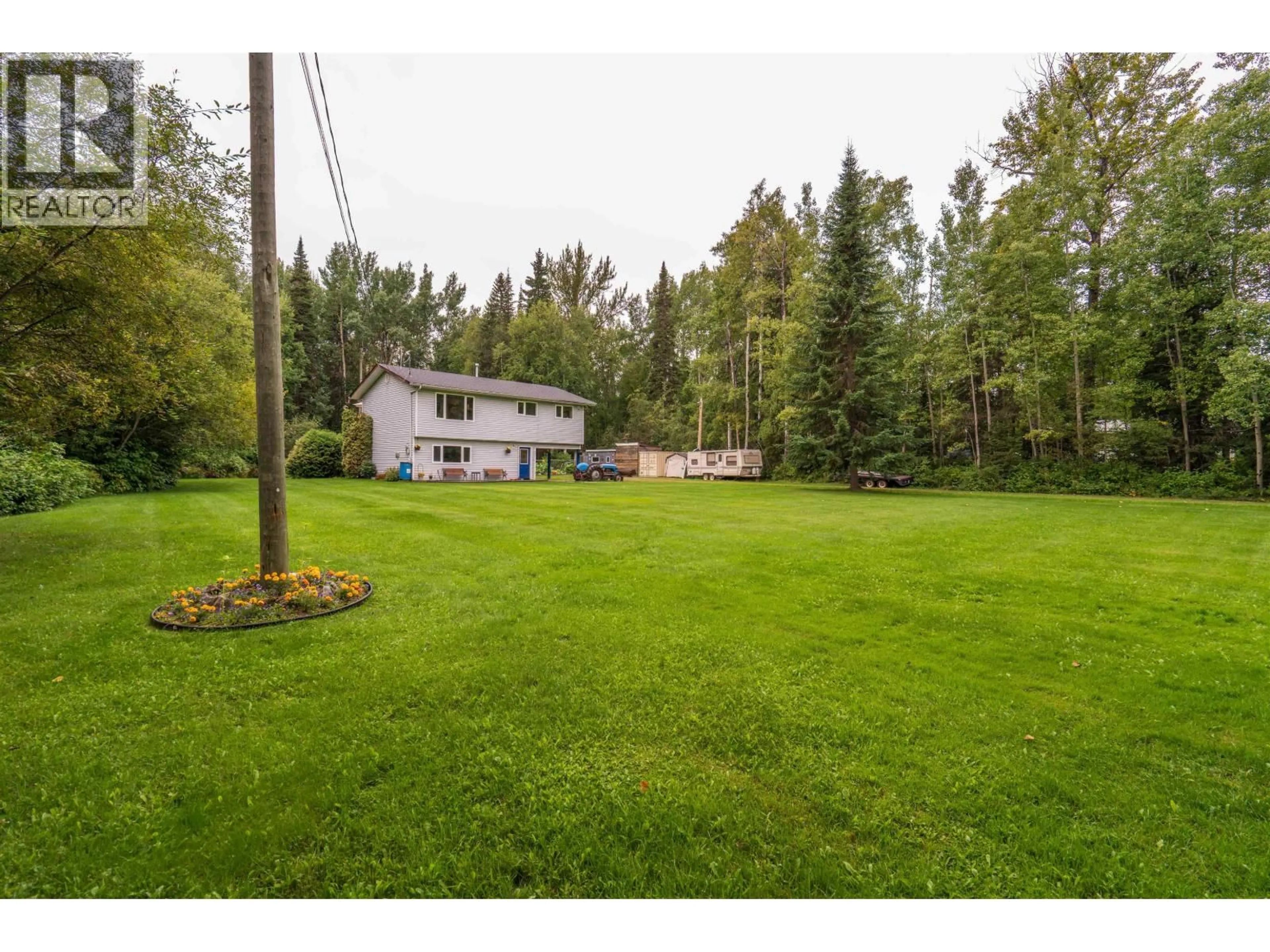 A pic from outside/outdoor area/front of a property/back of a property/a pic from drone, forest/trees view for 5027 SOOKE ROAD, Prince George British Columbia V2K5V1