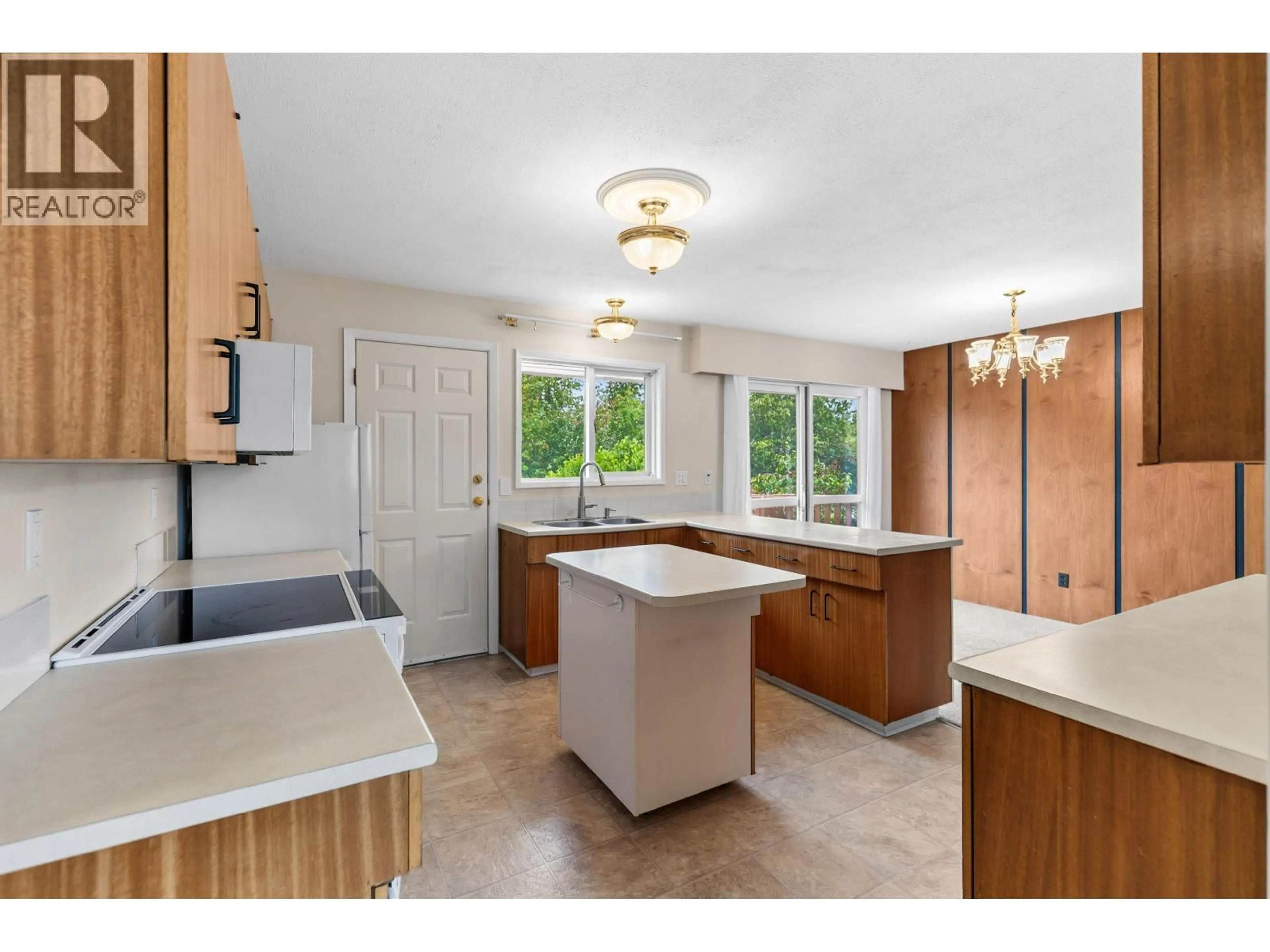 Open concept kitchen, ceramic/tile floor for 1411 MANSON CRESCENT, Prince George British Columbia V2M4A4