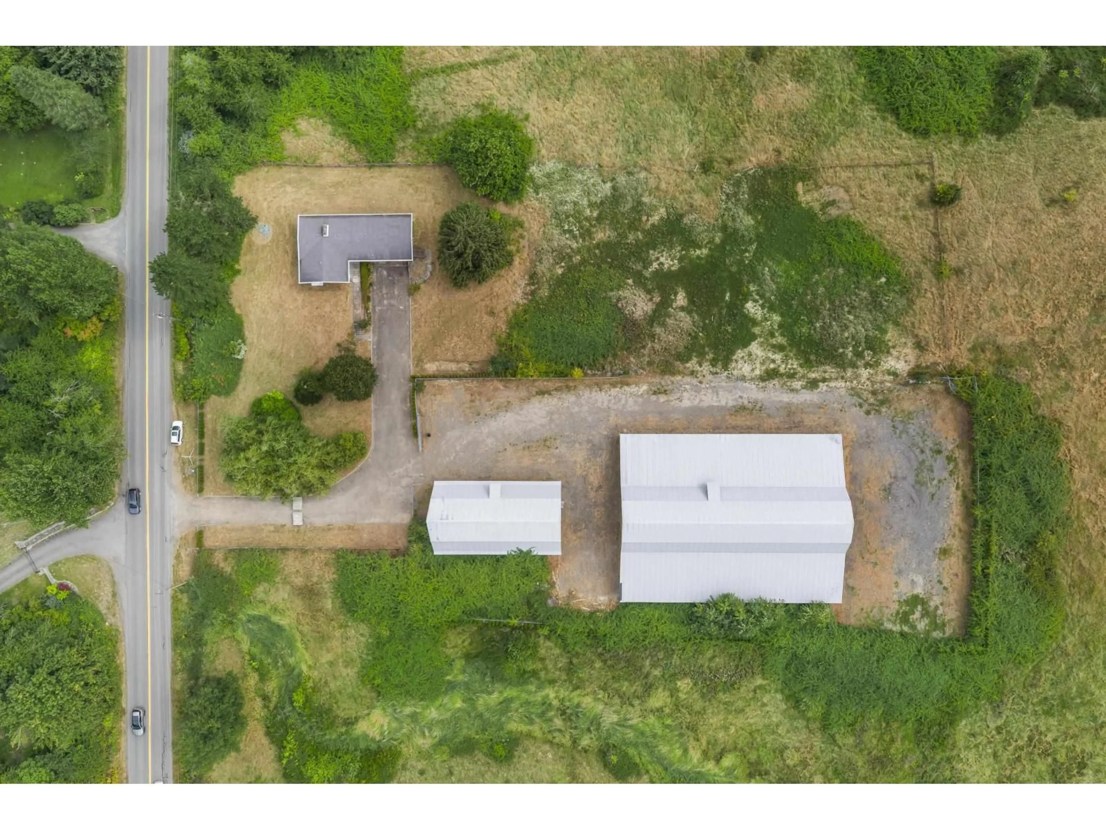 A pic from outside/outdoor area/front of a property/back of a property/a pic from drone, building for 29750 HARRIS ROAD, Abbotsford British Columbia V4X1Y9
