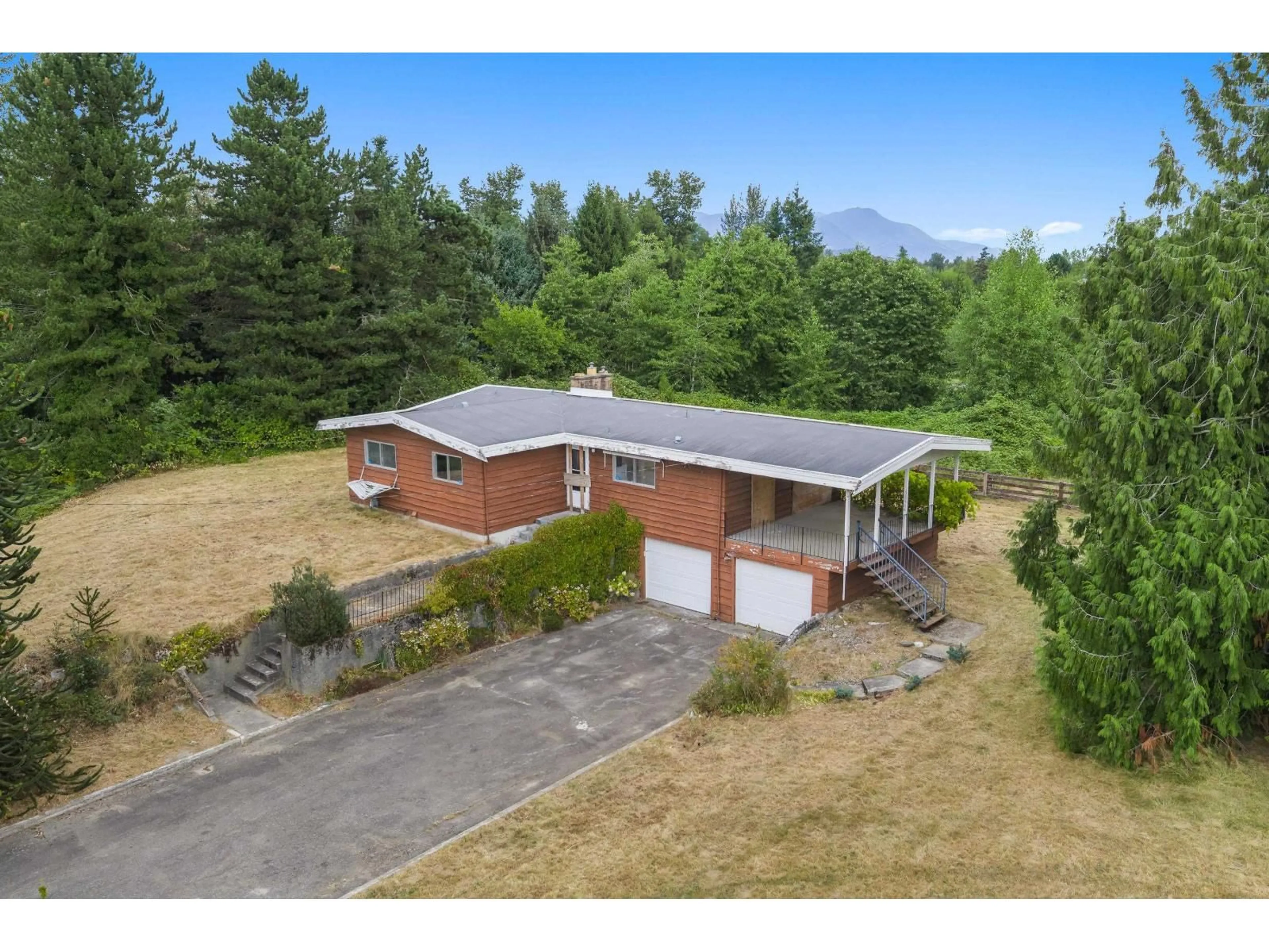 A pic from outside/outdoor area/front of a property/back of a property/a pic from drone, mountain view for 29750 HARRIS ROAD, Abbotsford British Columbia V4X1Y9
