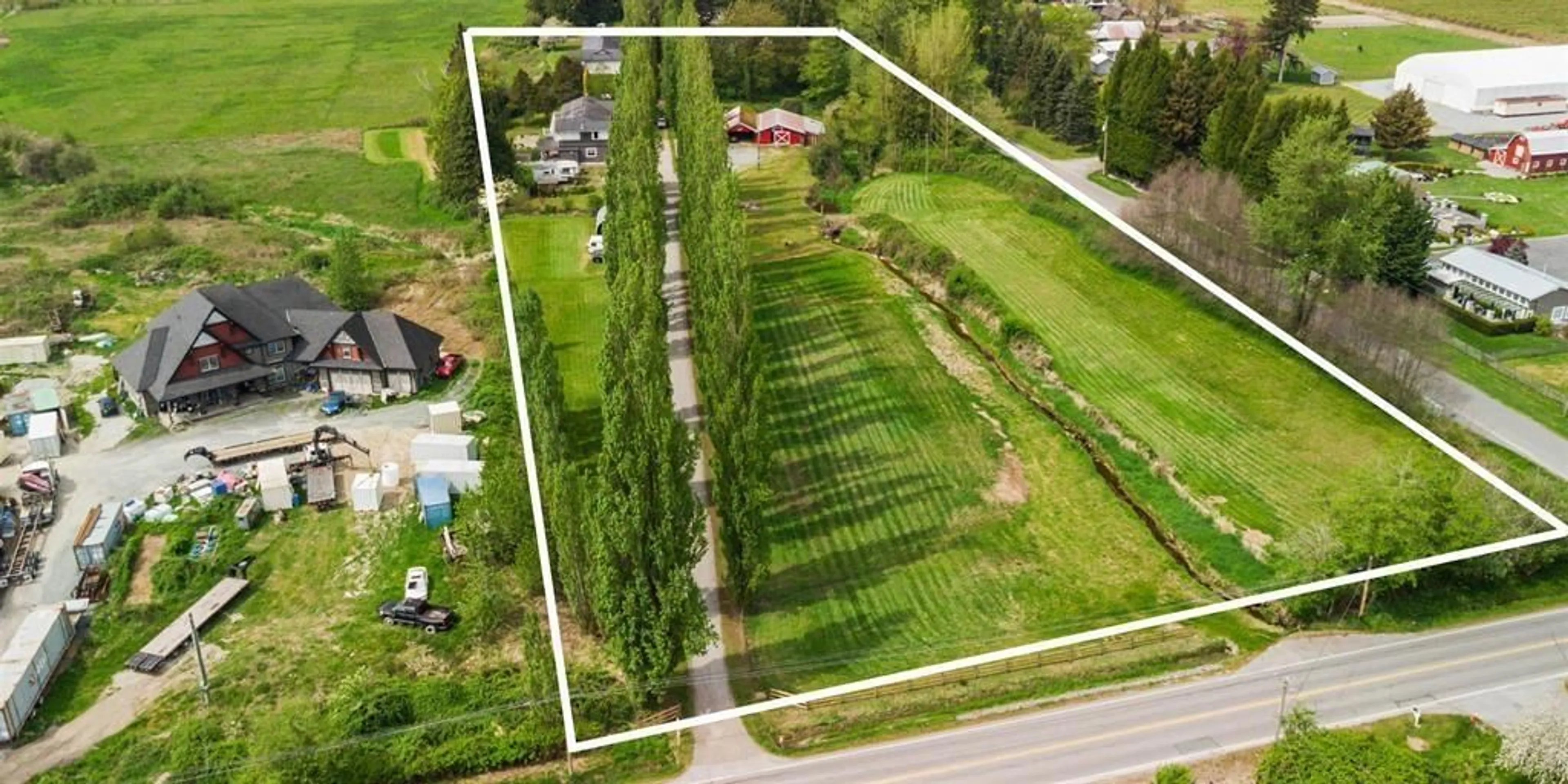 A pic from outside/outdoor area/front of a property/back of a property/a pic from drone, water/lake/river/ocean view for 3173 216 STREET, Langley British Columbia V2Z2E6