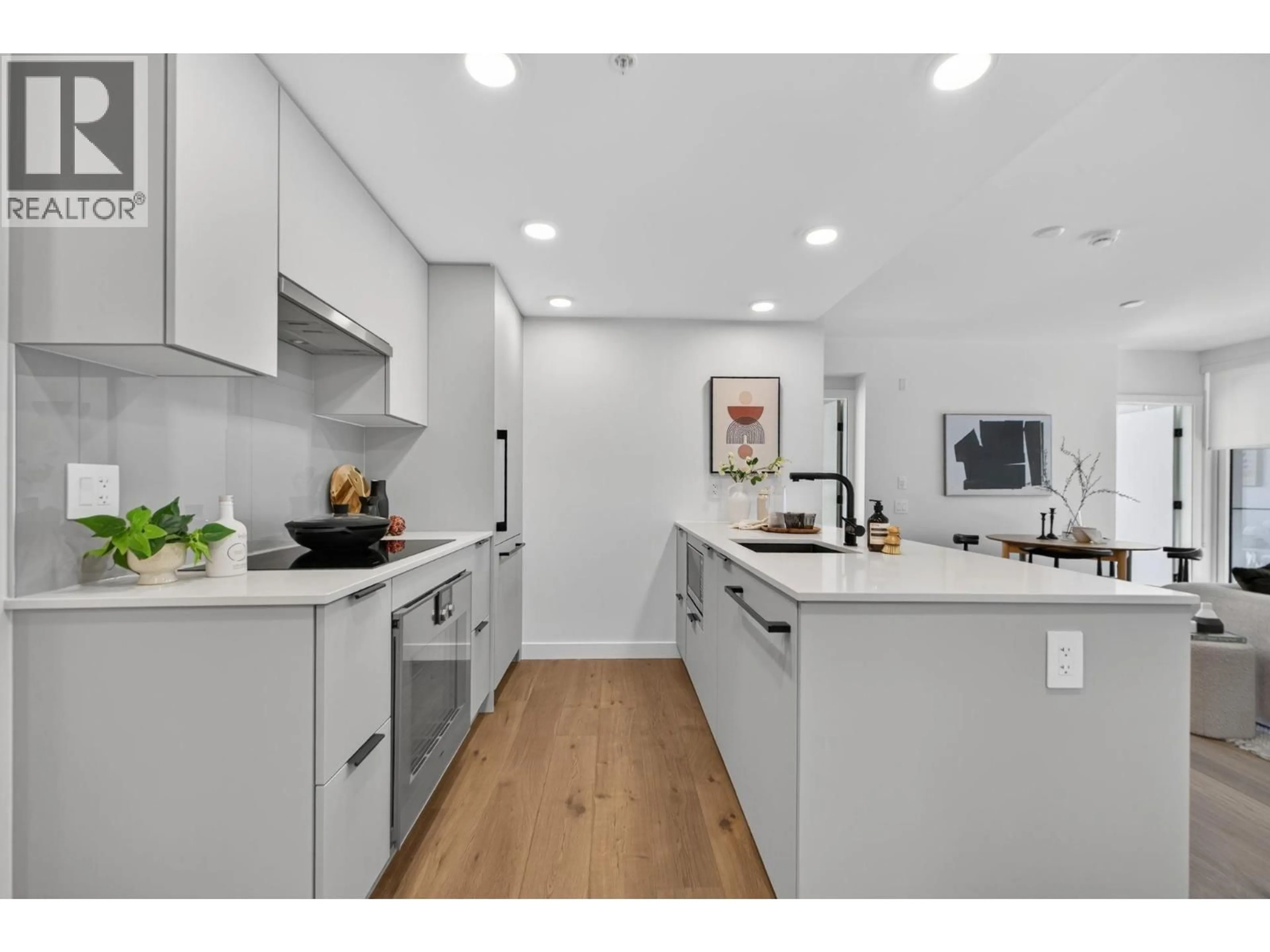 Open concept kitchen, unknown for 202 - 8030 OAK STREET, Vancouver British Columbia V6P0M9