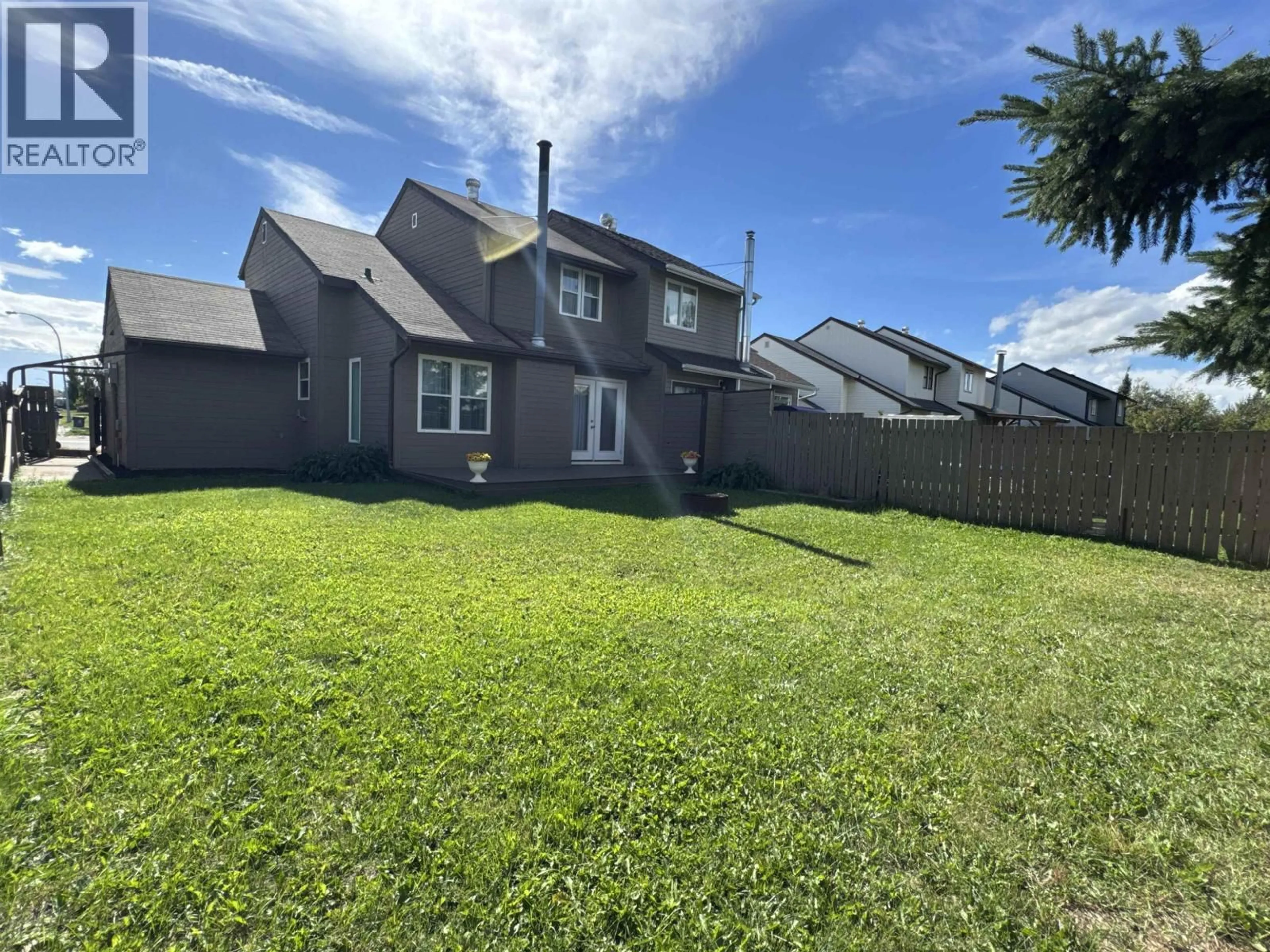 A pic from outside/outdoor area/front of a property/back of a property/a pic from drone, street for 8820 107A AVENUE, Fort St. John British Columbia V1J5Z1