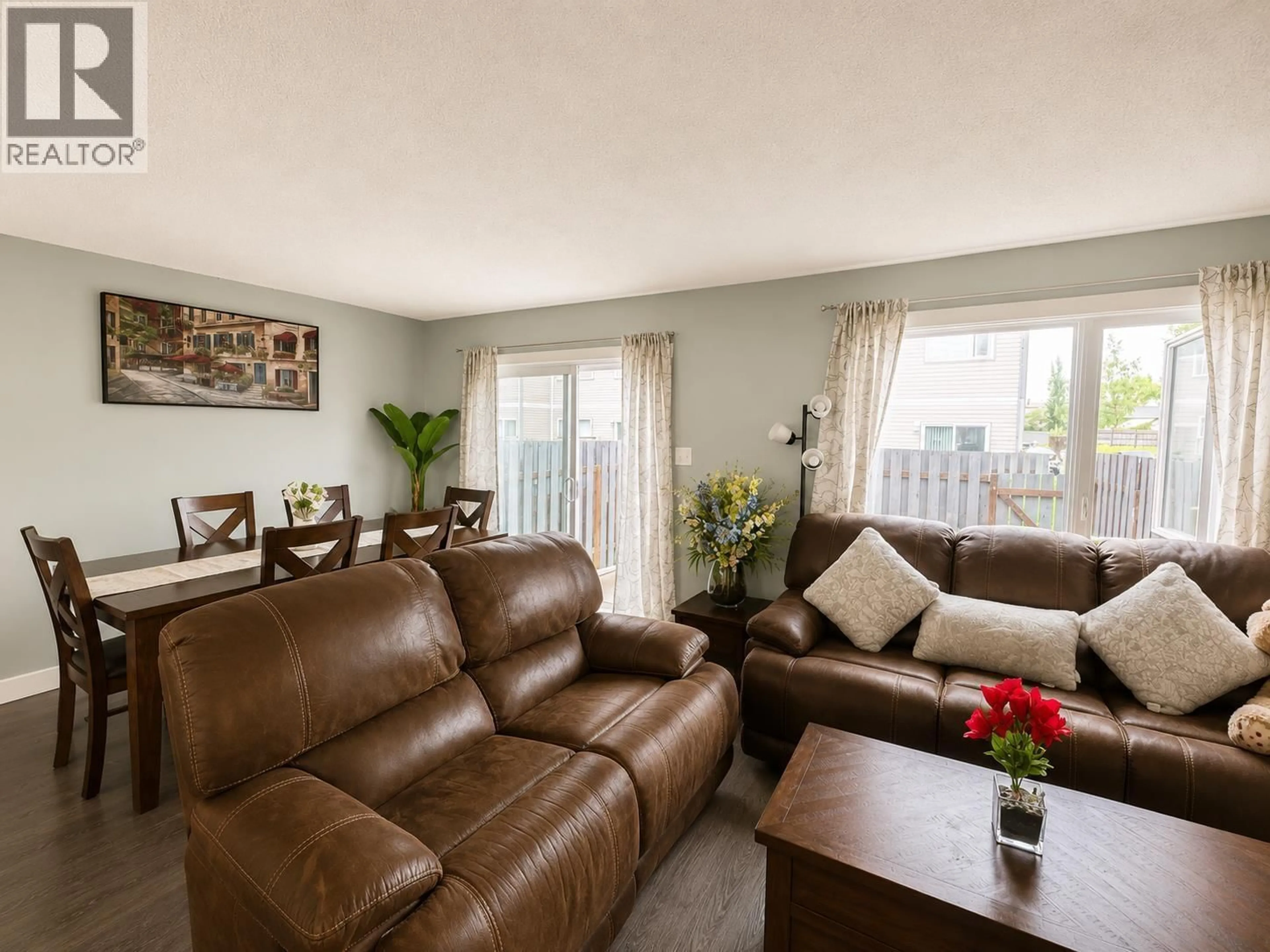Living room with furniture, wood/laminate floor for 319 - 2550 OSPIKA BOULEVARD, Prince George British Columbia V2N3T2