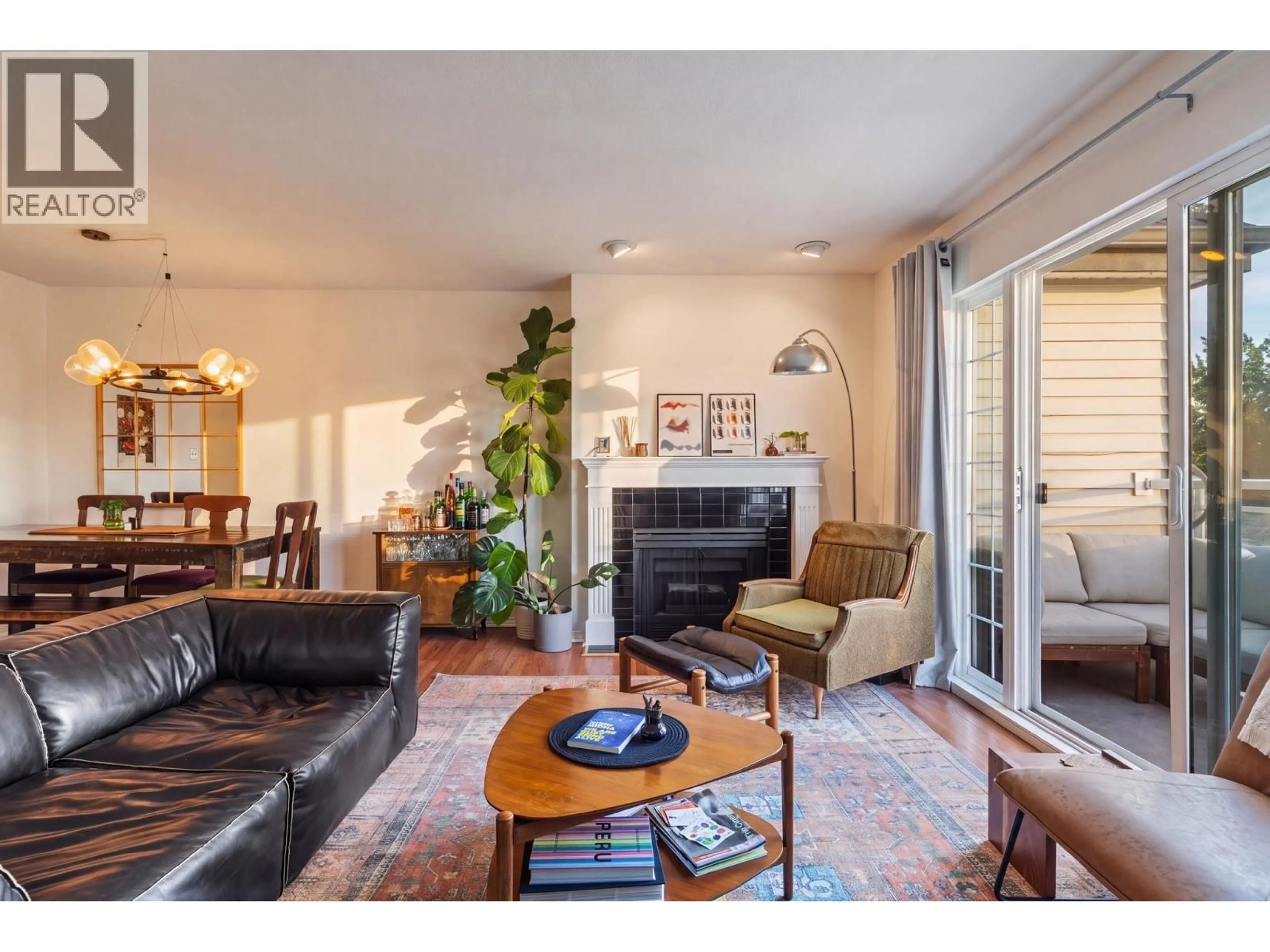 Living room with furniture, wood/laminate floor for 306 - 1868 11TH AVENUE, Vancouver British Columbia V5N1Z1