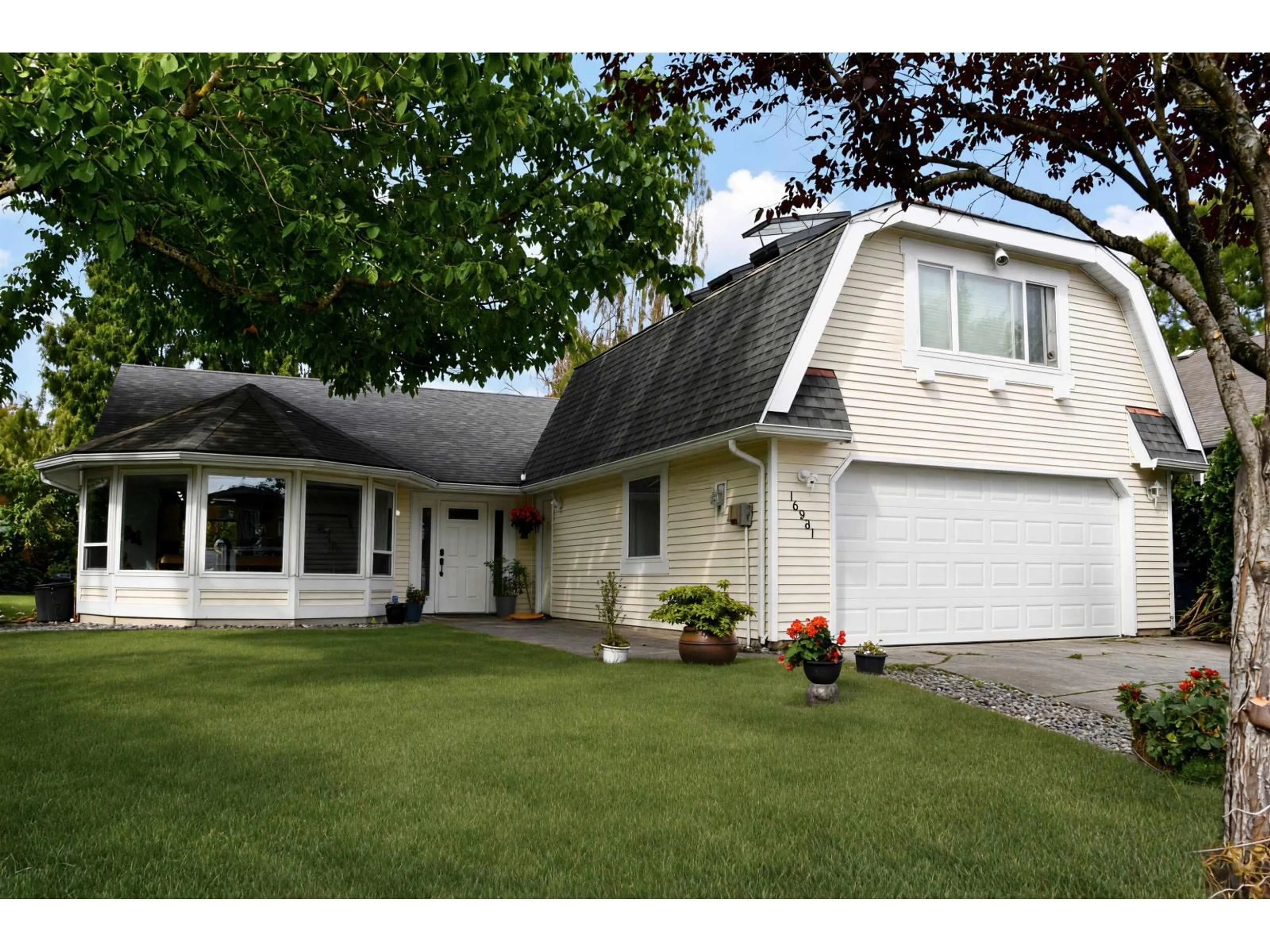 Home with vinyl exterior material, street for 16281 11 AVENUE, Surrey British Columbia V4A7W9