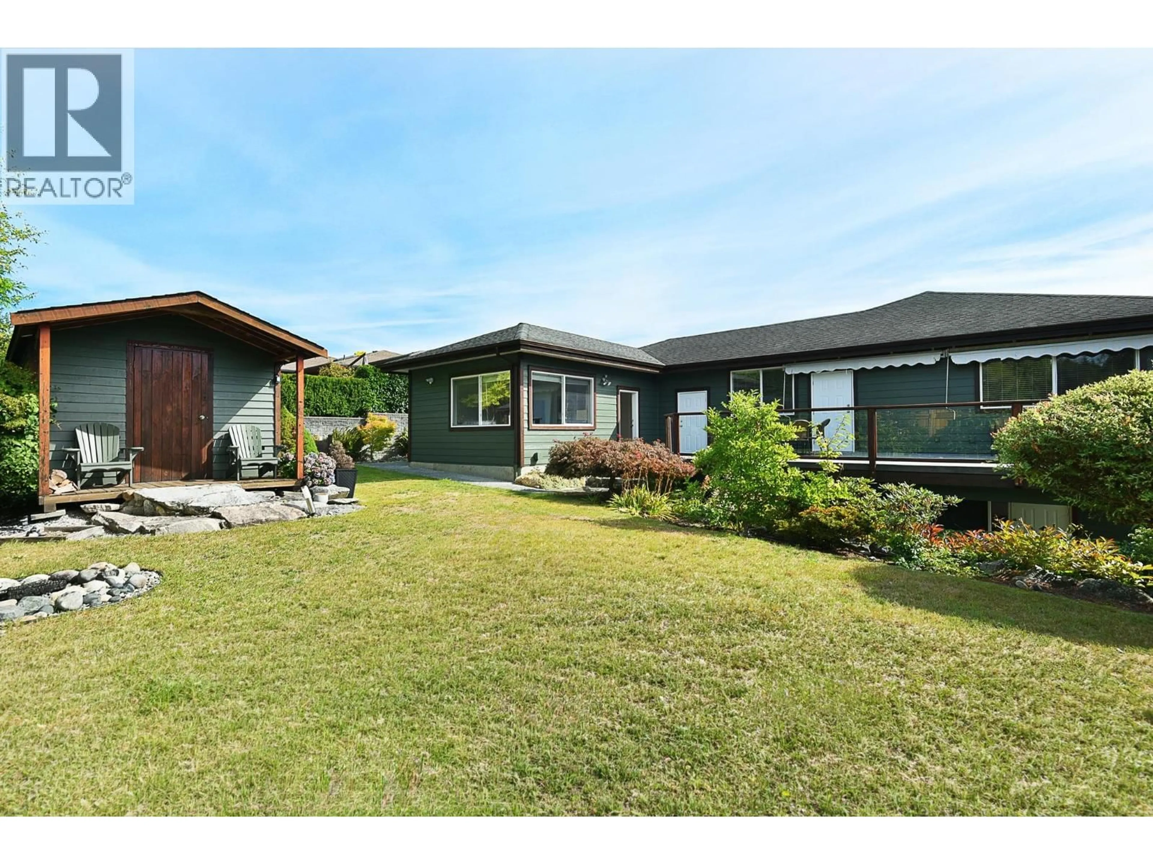 A pic from outside/outdoor area/front of a property/back of a property/a pic from drone, street for 6277 BAILLIE ROAD, Sechelt British Columbia V7Z0R5