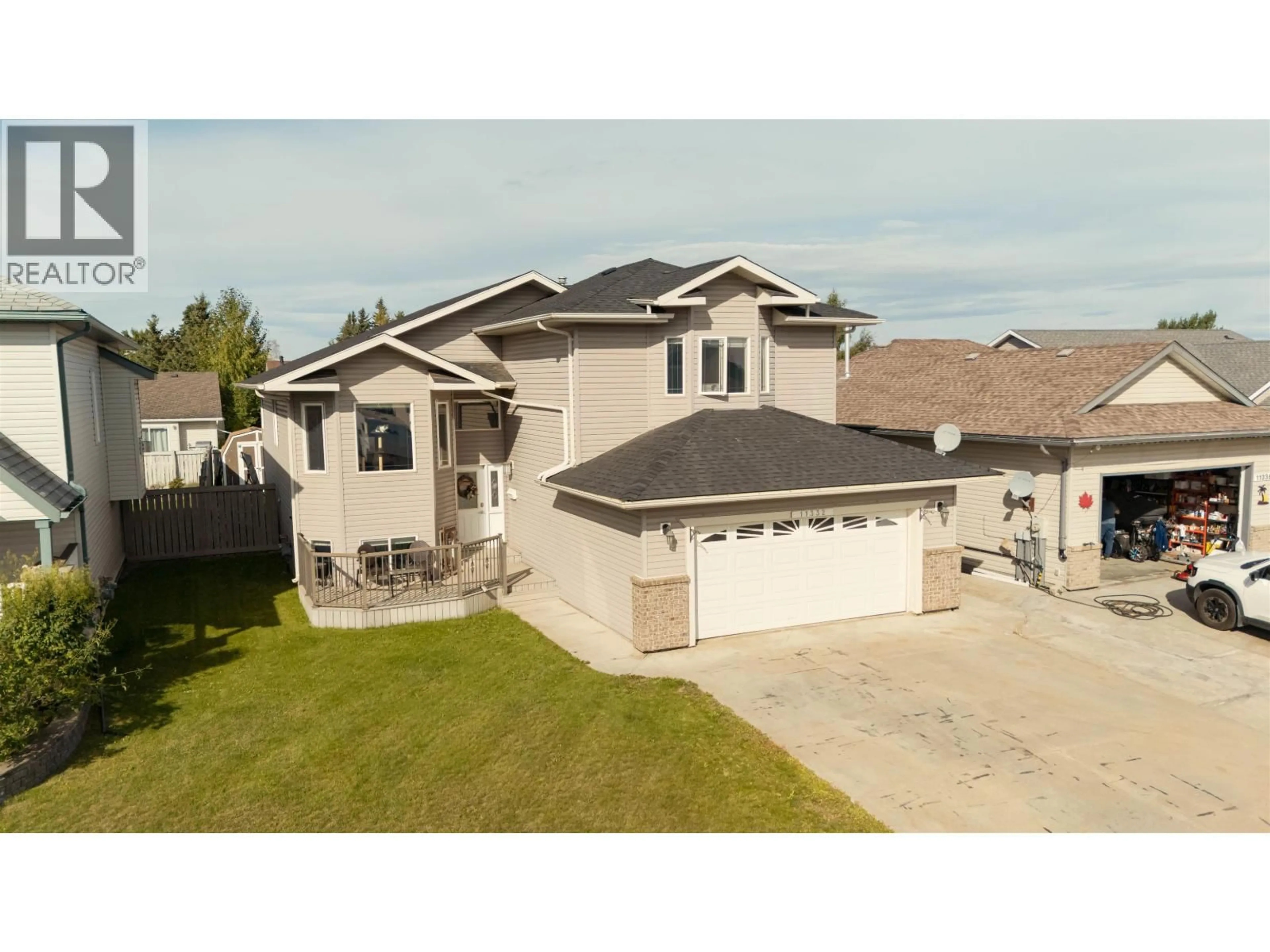 A pic from outside/outdoor area/front of a property/back of a property/a pic from drone, street for 11332 97 STREET, Fort St. John British Columbia V1J7H8