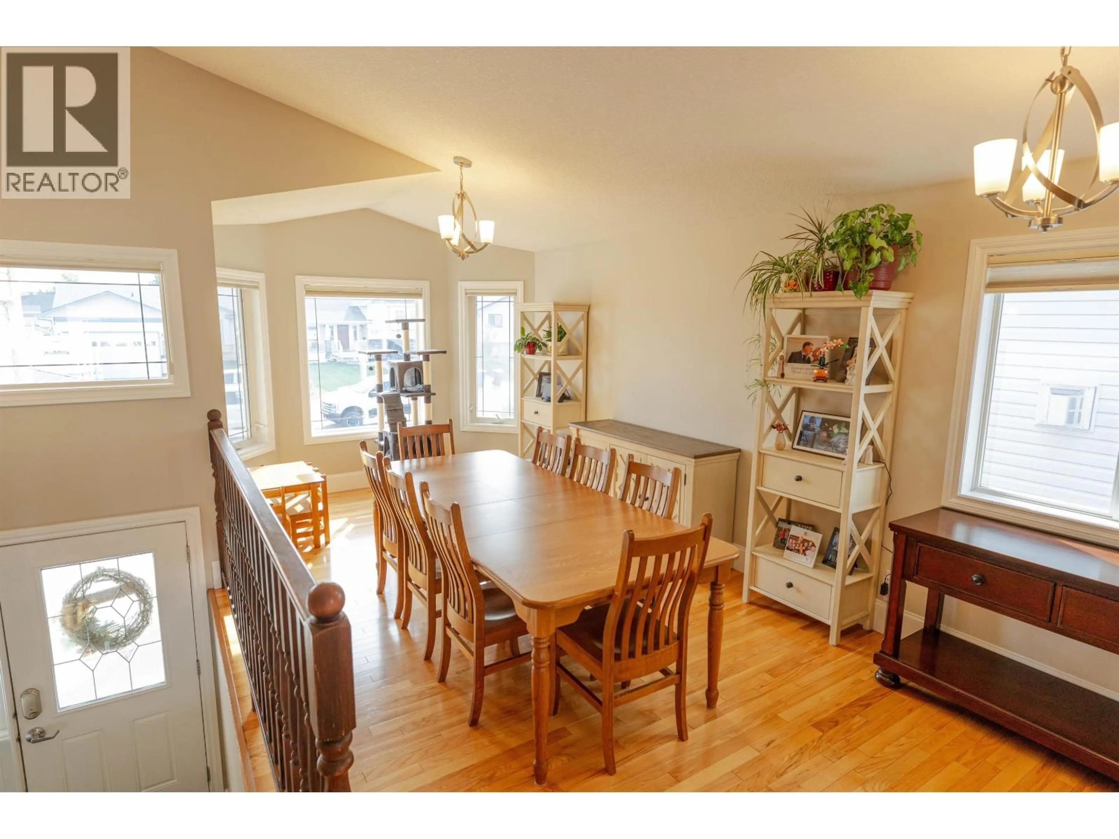 Dining room, wood/laminate floor for 11332 97 STREET, Fort St. John British Columbia V1J7H8